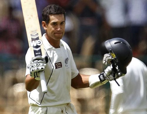 Ross Taylor raises his bat after scoring a century vs India