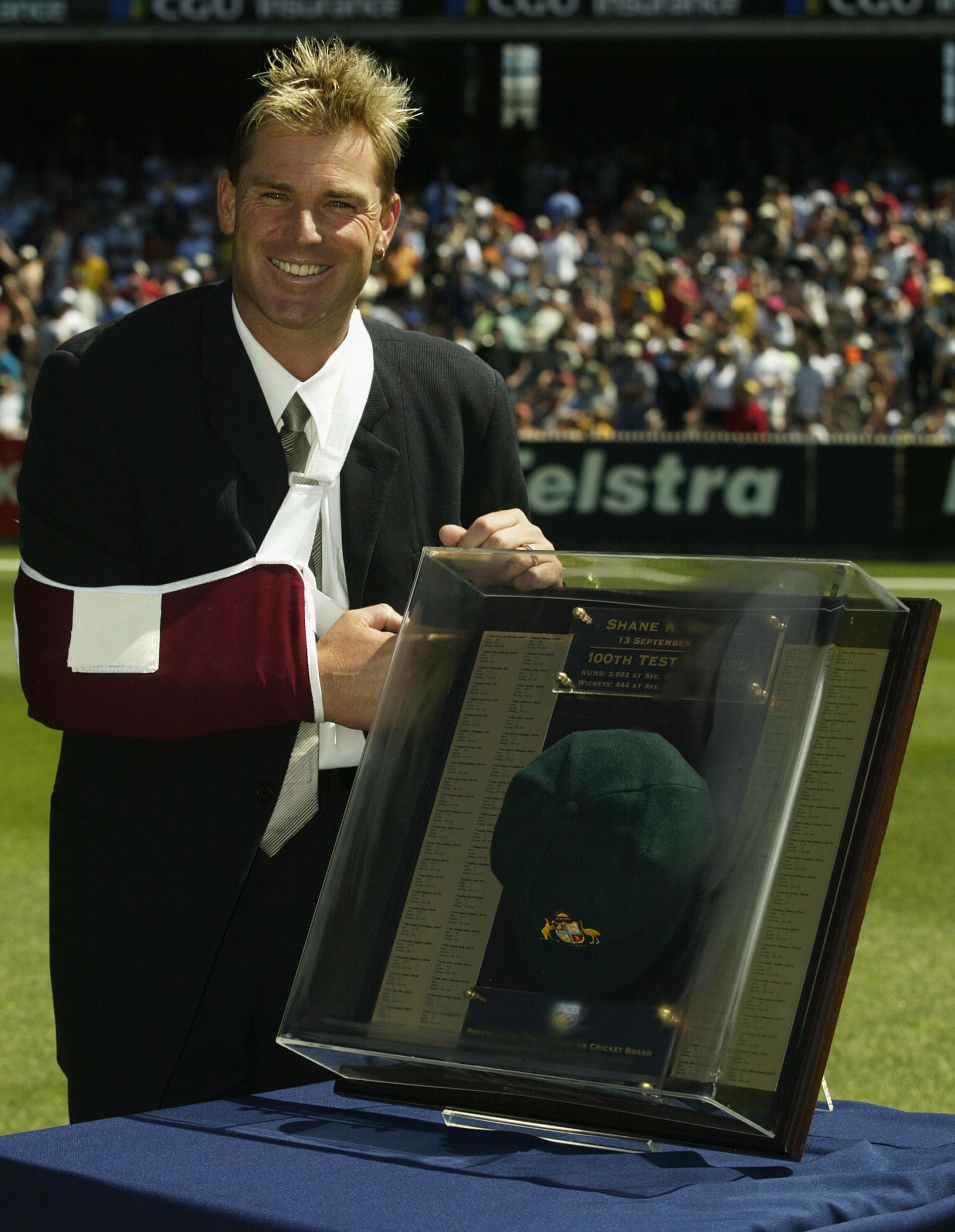 Shane Warne recieves his 100th Test Cap