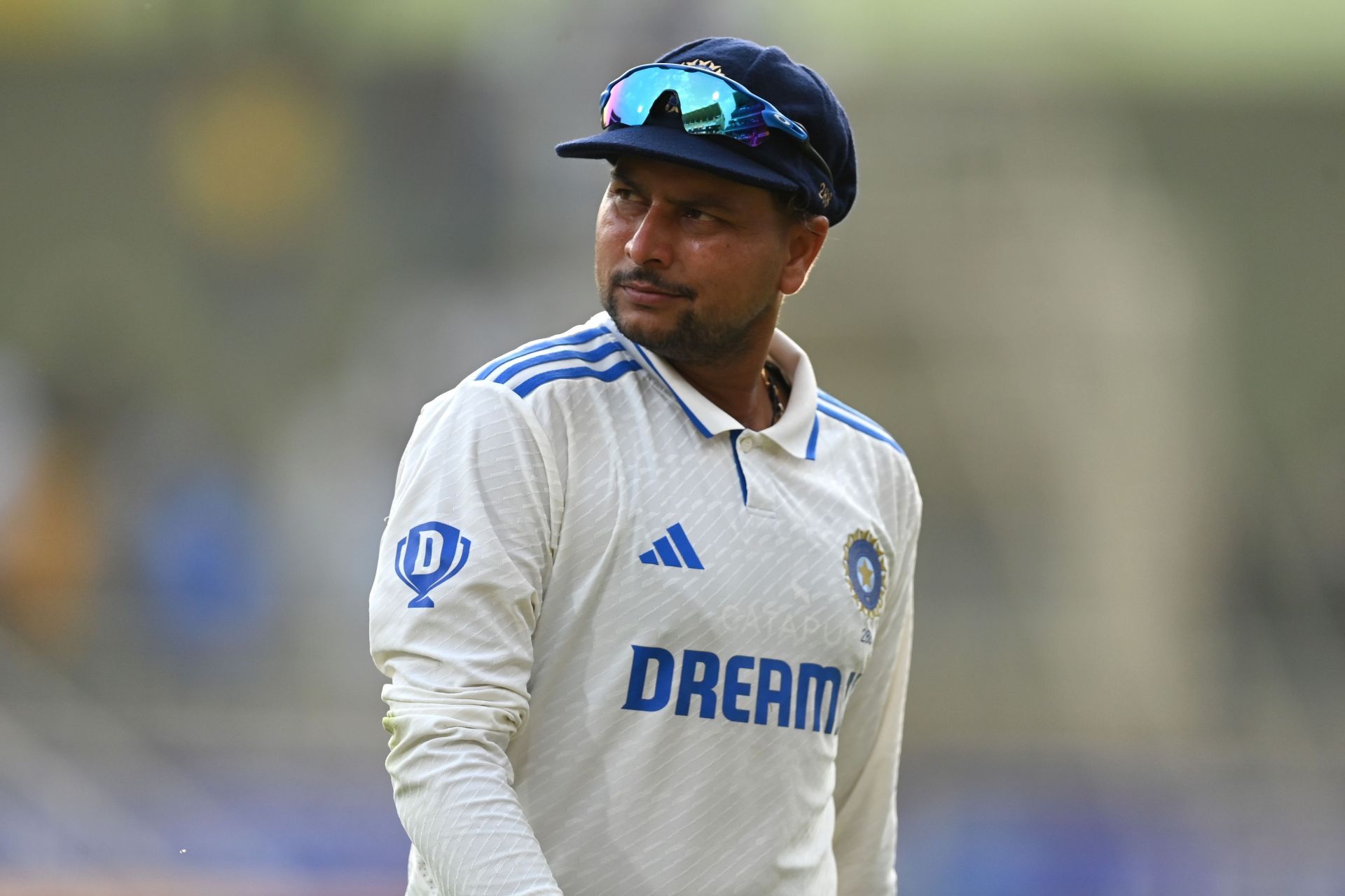 Kuldeep looks on: India v England - 4th Test Match: Day One