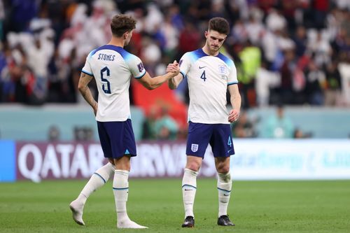 John Stones (left) and Declan Rice (right) will be foes this Sunday.