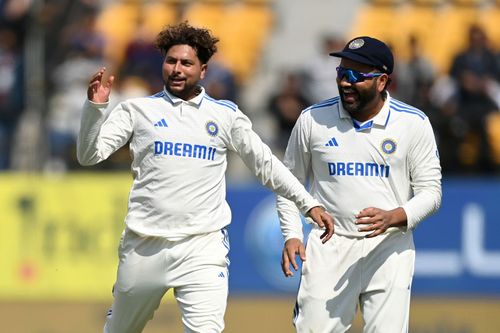 Rohit Sharma (right) introduced Kuldeep Yadav into the attack before Ravindra Jadeja.