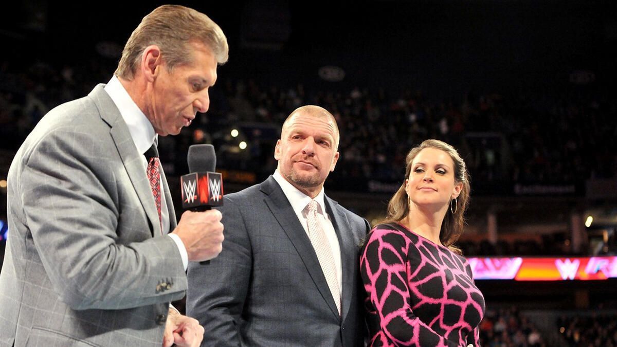 Left to right: Vince McMahon, Triple H, Stephanie McMahon