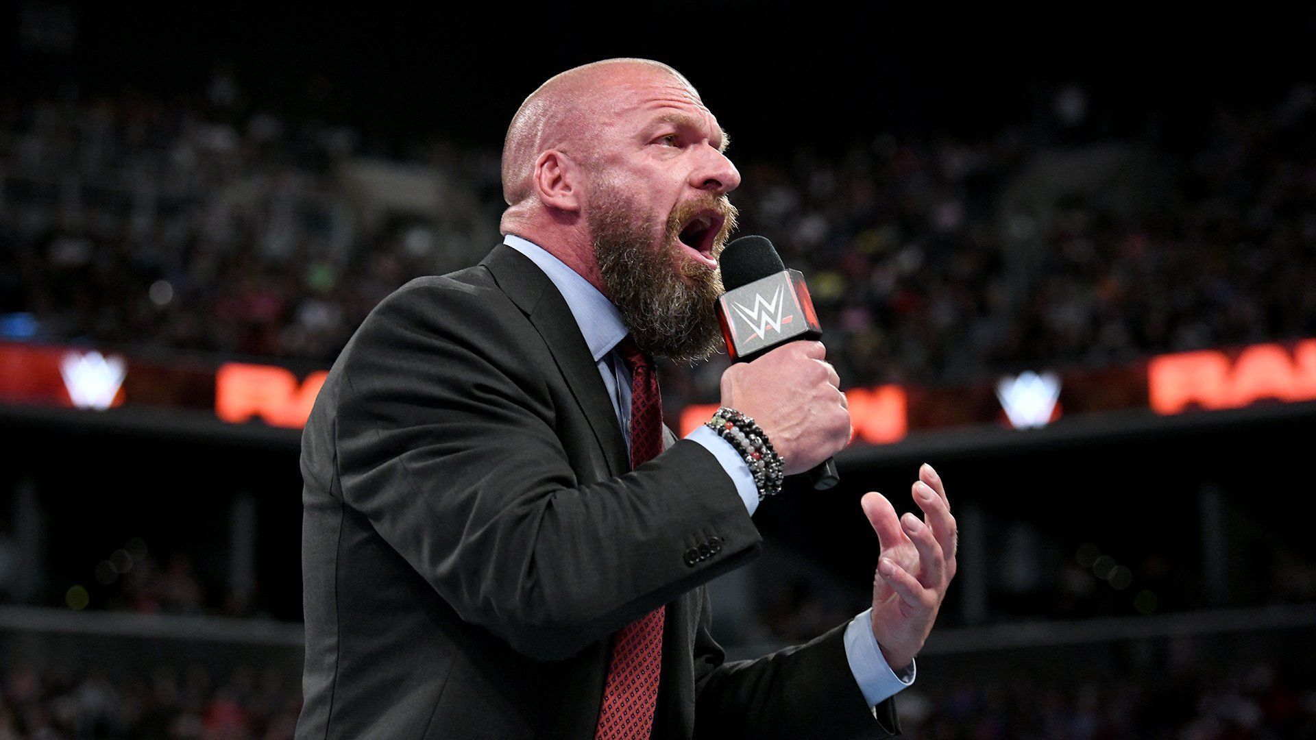 WWE Chief Content Officer Triple H addresses the crowd on RAW