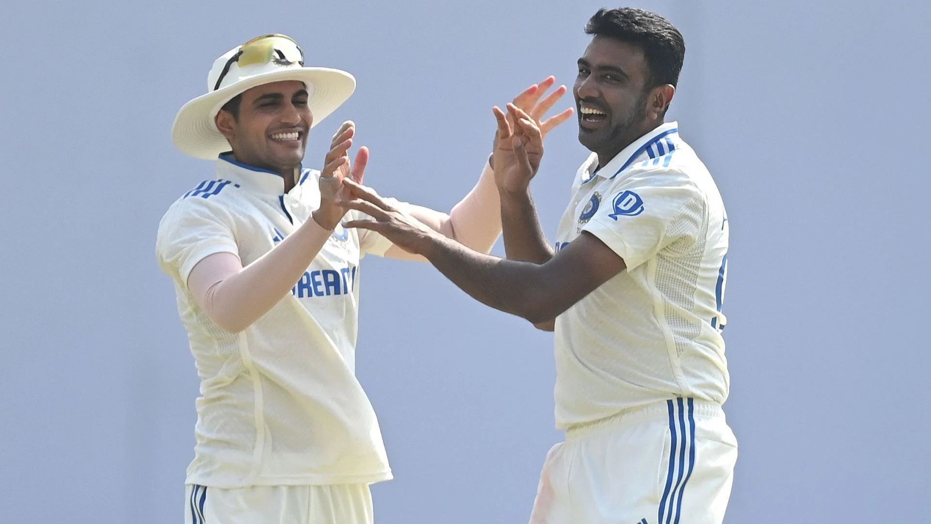 Shubman Gill (L) &amp; Raichandran Ashwin in action for India