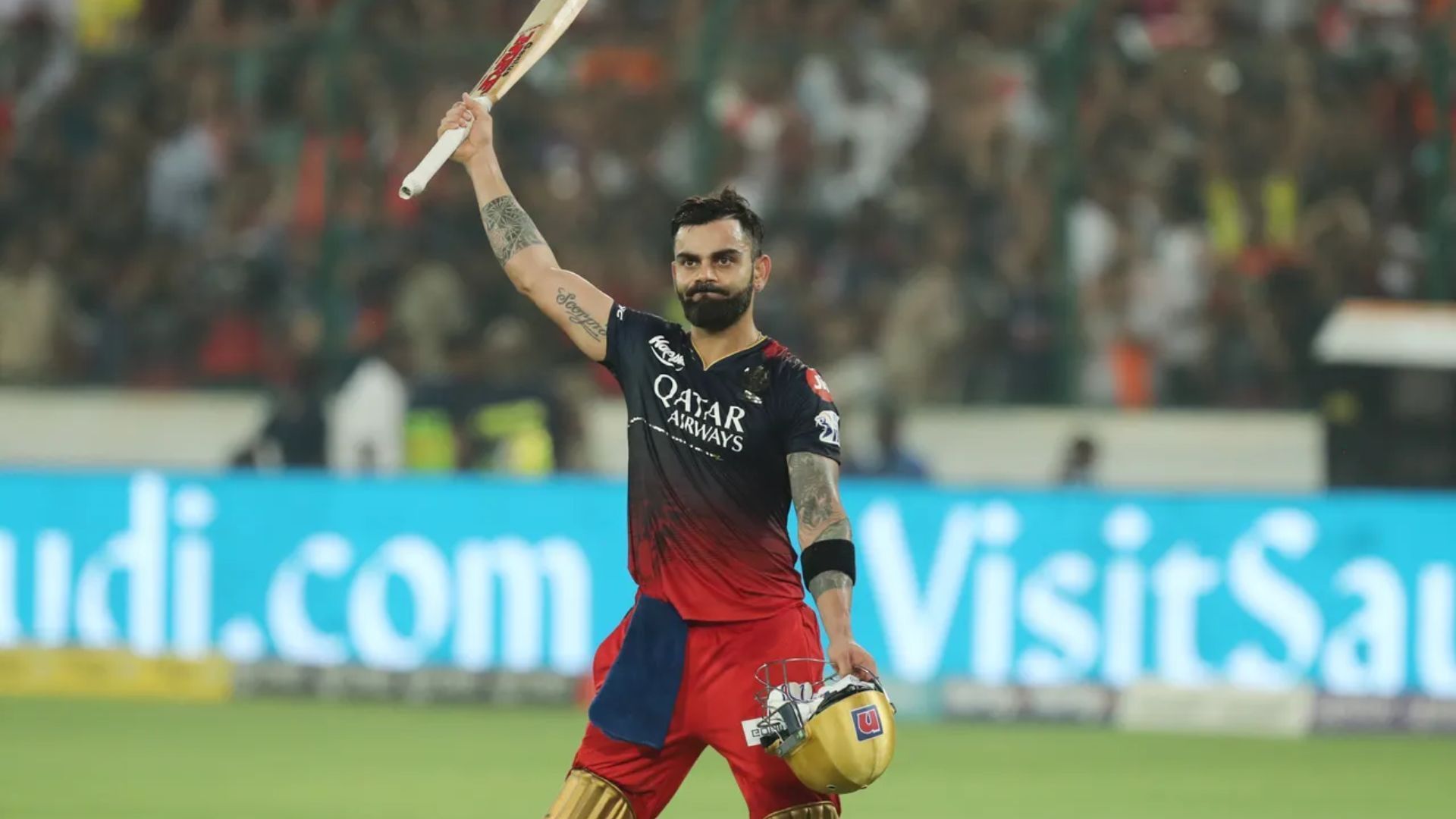 Virat Kohli walks back after scoring a hundred against SRH in IPL 2023