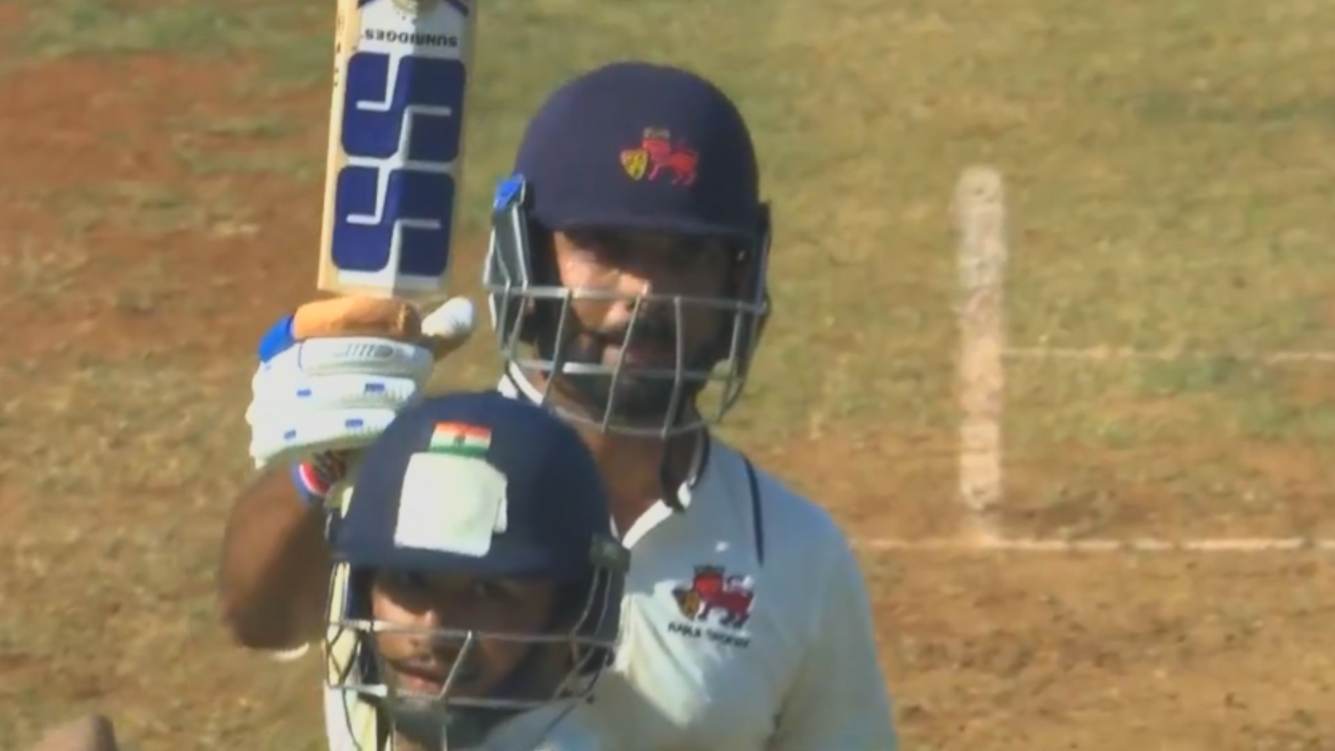 Ajinkya Rahane celebrates after scoring his half-century on Day 2