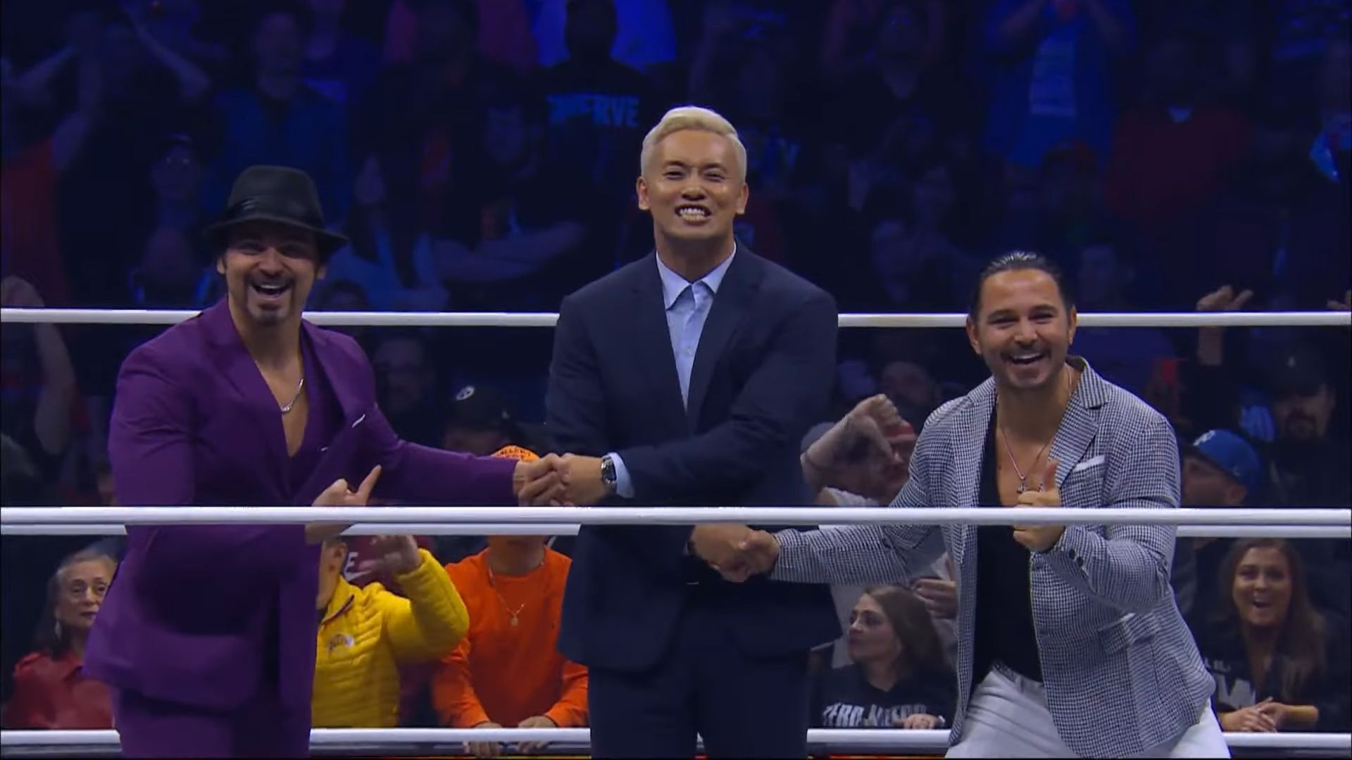 Okada poses with The Young Bucks (via AEW