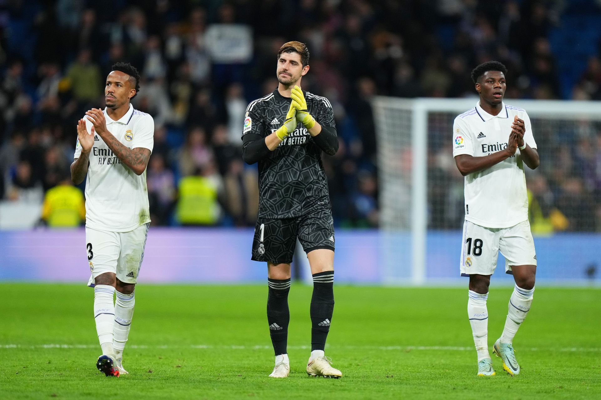 Eder Militao (left) and Thibaut Courtois