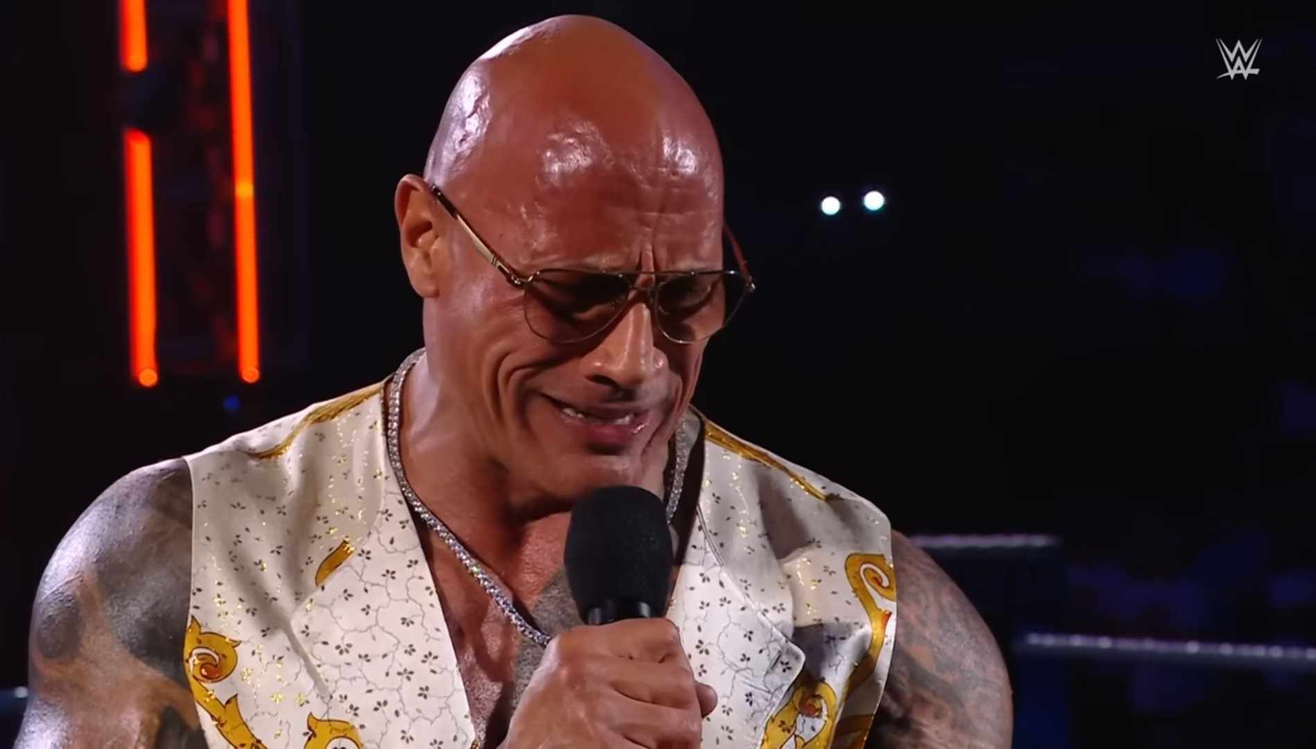 The Rock is not joking around. [Image via WWE YouTube.]