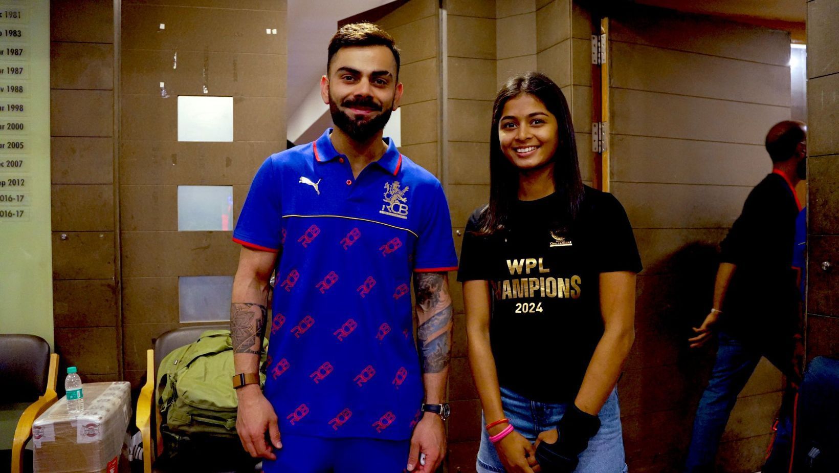 Virat Kohli (L) and Shreyanka Patil.