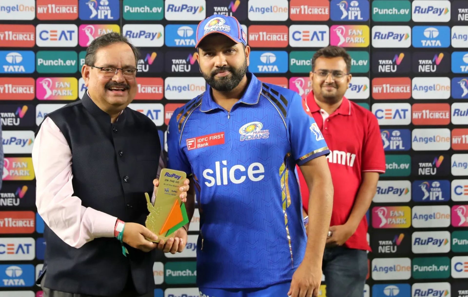 Rohit Sharma receiving an award after MI vs GT IPL 2024 clash. 