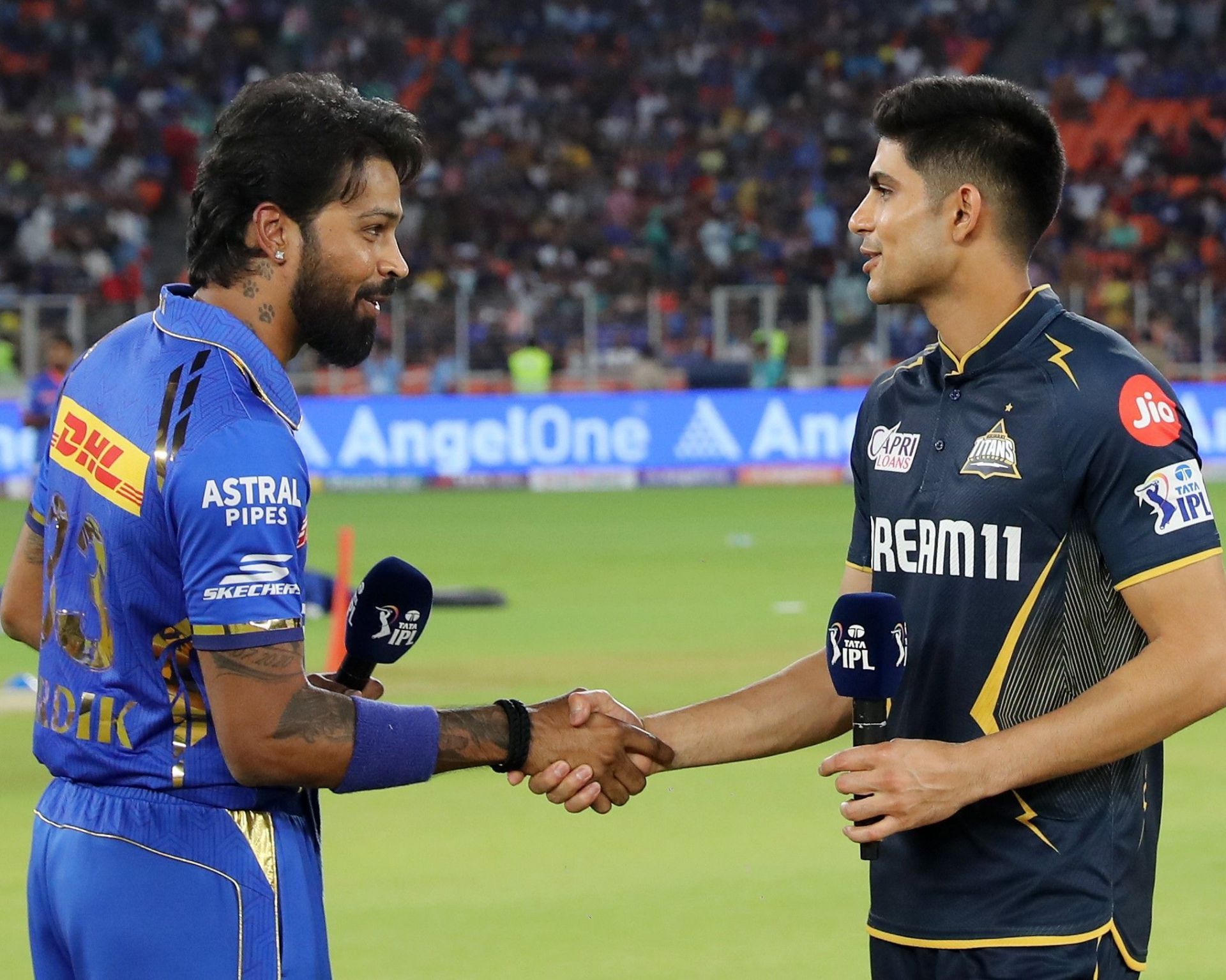 Former Gujarat Titans and current MI skipper Hardik Pandya with his opposite number Shubman Gill. [MI]