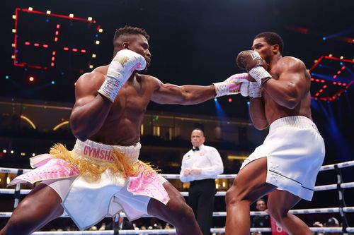 Anthony Joshua handed Cristiano Ronaldo's close friend Francis Ngannou his first knockout defeat.