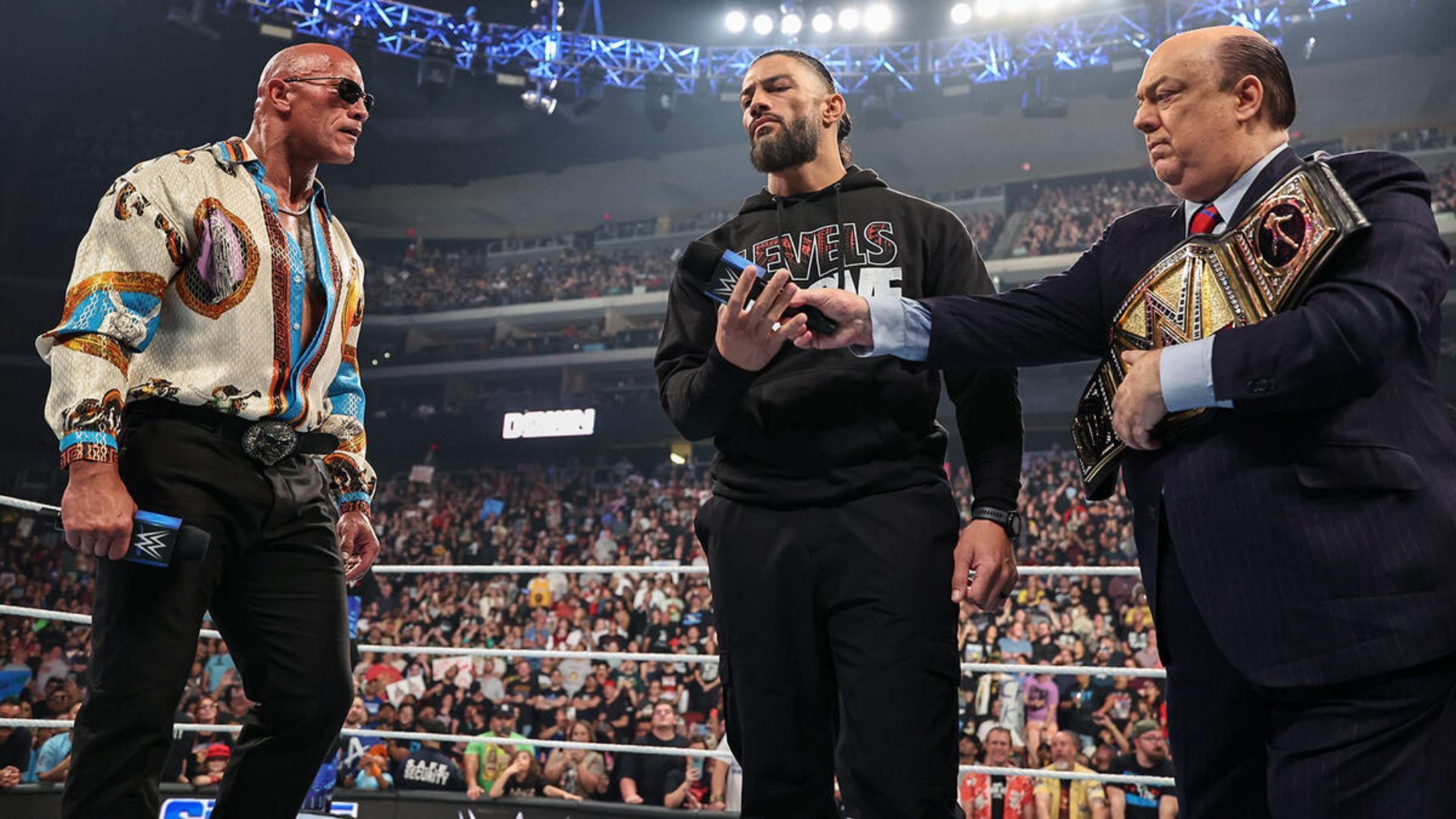 The Rock, Roman Reigns, and Paul Heyman are Bloodline members