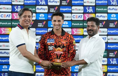 Abhishek Sharma receiving the POTM award