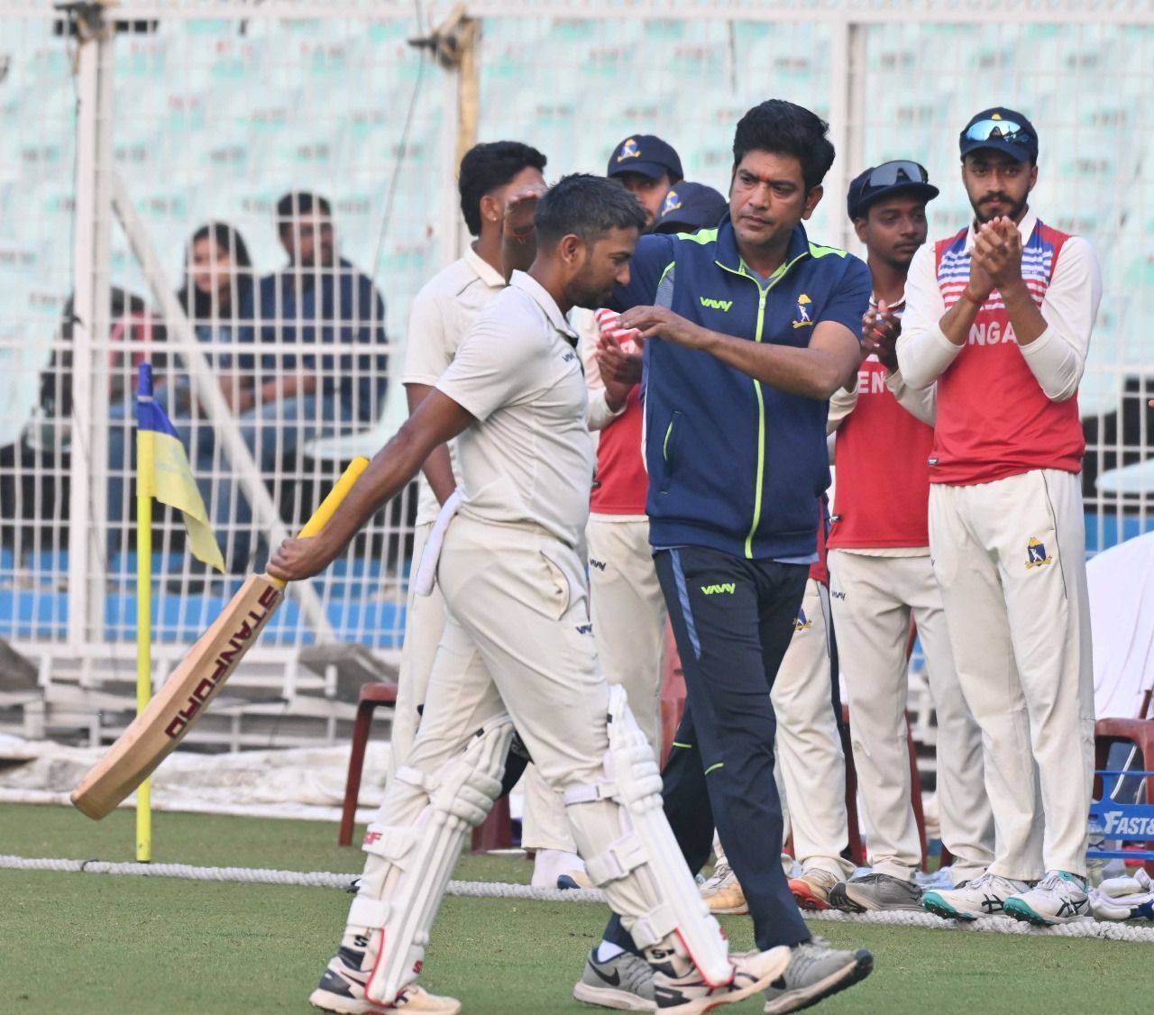 Anustup Majumdar is applauded off the field after his 108* versus Mumbai