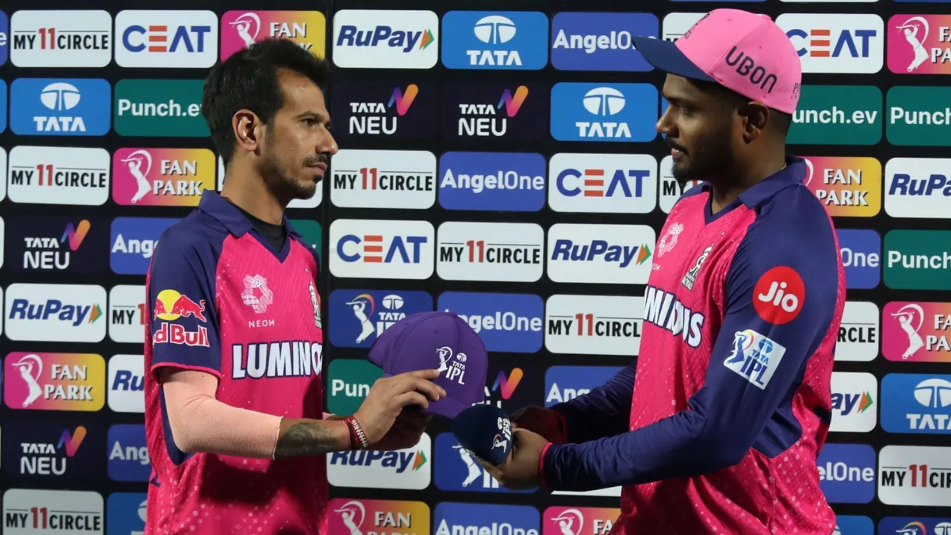 Sanju Samson hands the Purple cap to Yuzvendra Chahal