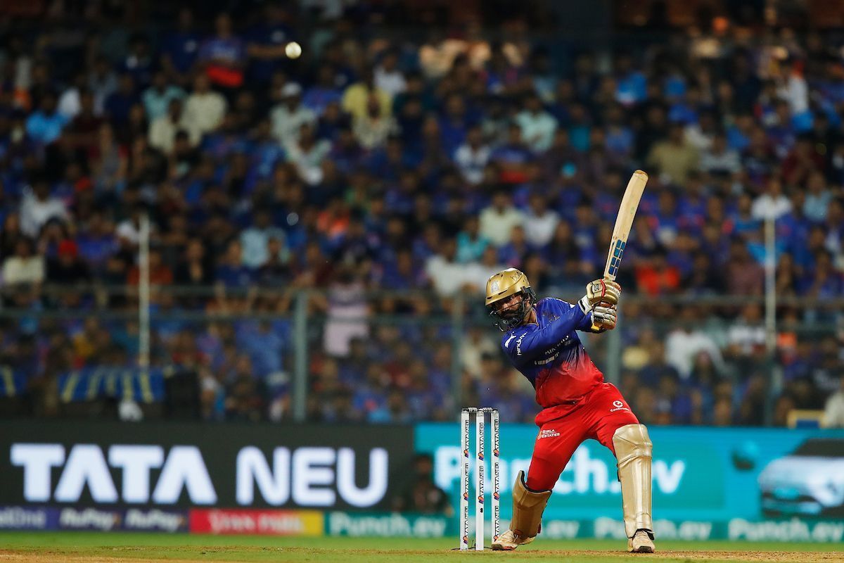 Dinesh Karthik scored an unbeaten half-century to power RCB