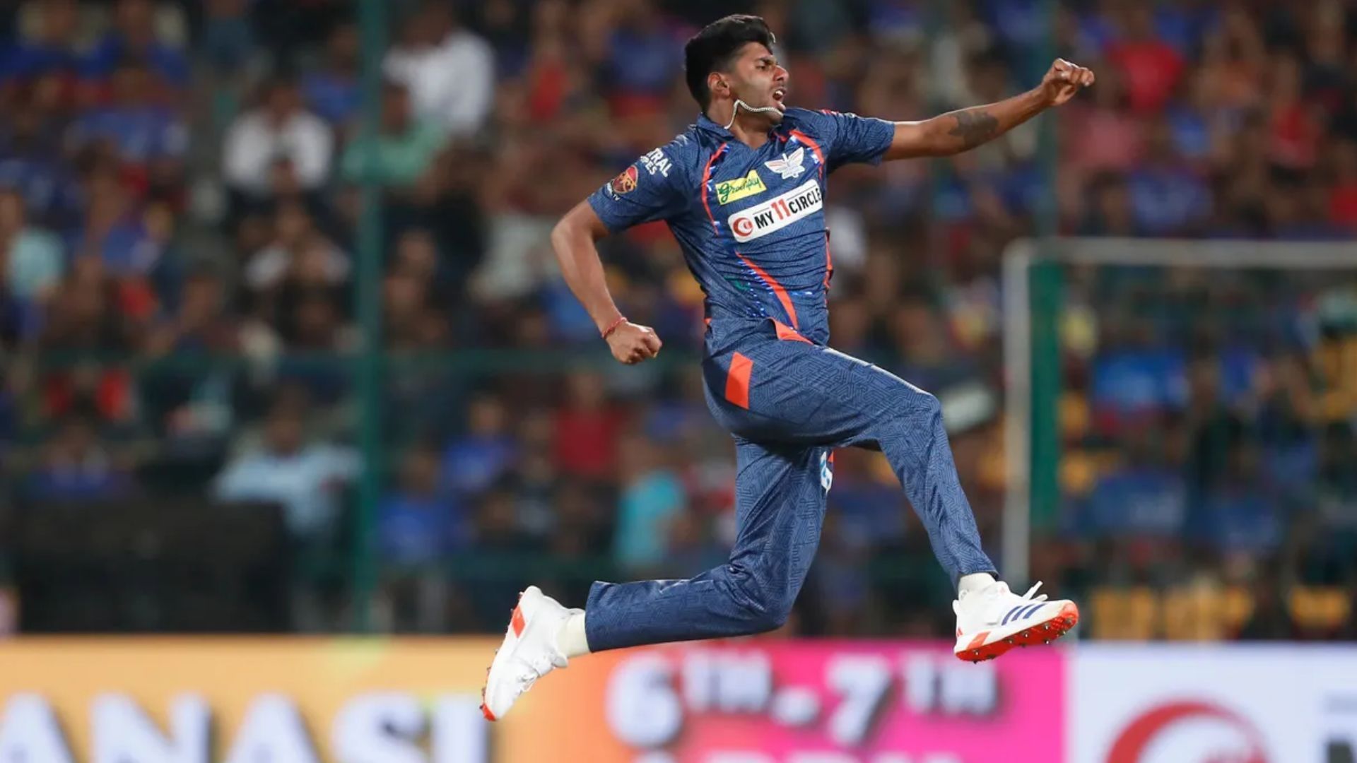 Mayank Yadav celebrates the wicket of Cameron Green