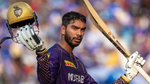 Venkatesh Iyer raises his bat after scoring his century against MI in 2023.