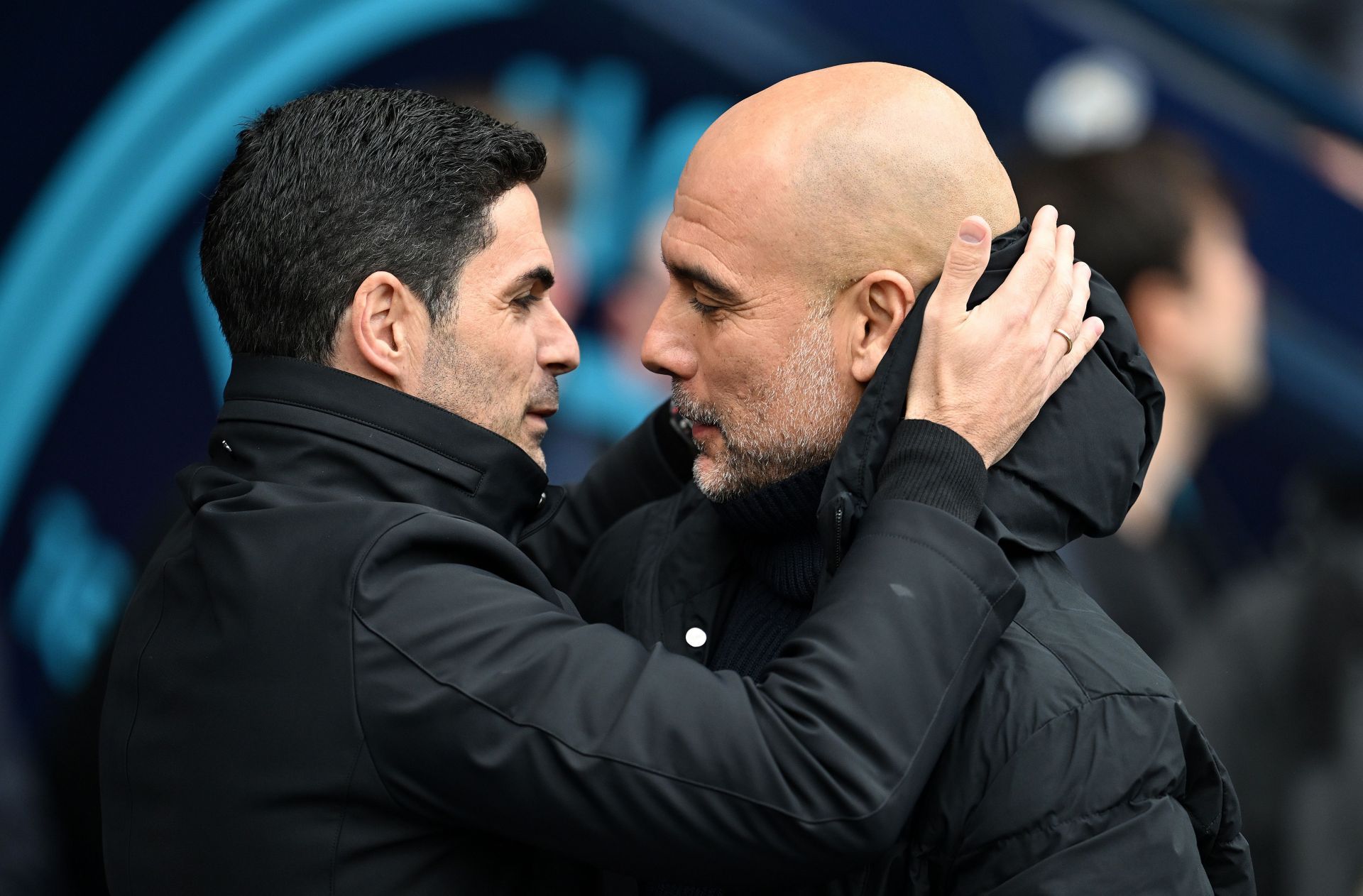 Gunners boss Mikel Arteta (left) greets his Manchester City counterpart Pep Guardiola