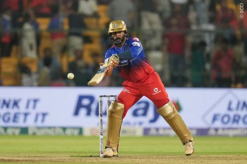 Dinesh Karthik playing a reverse ramp on Monday. [IPL]