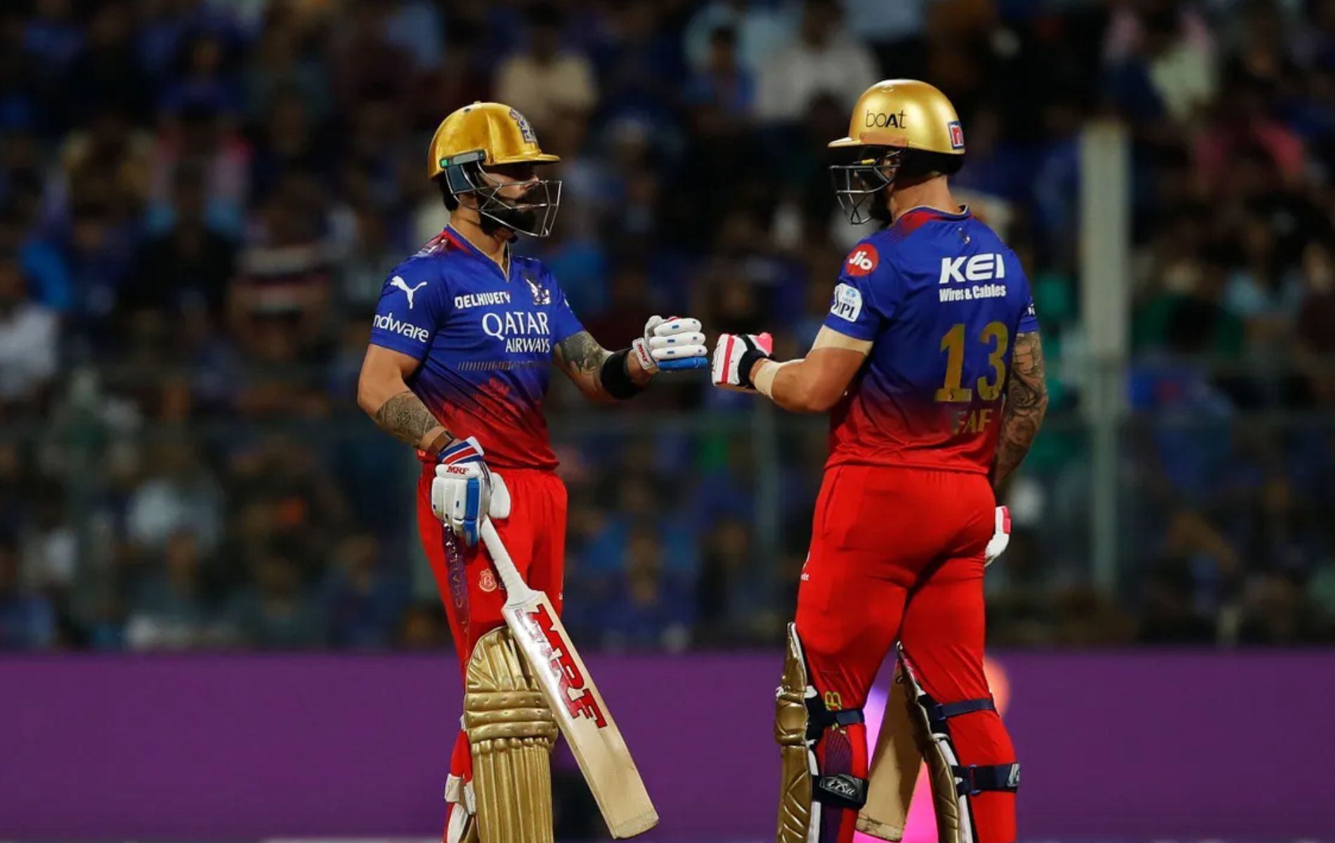 Virat Kohli (L) and Faf du Plessis (R).