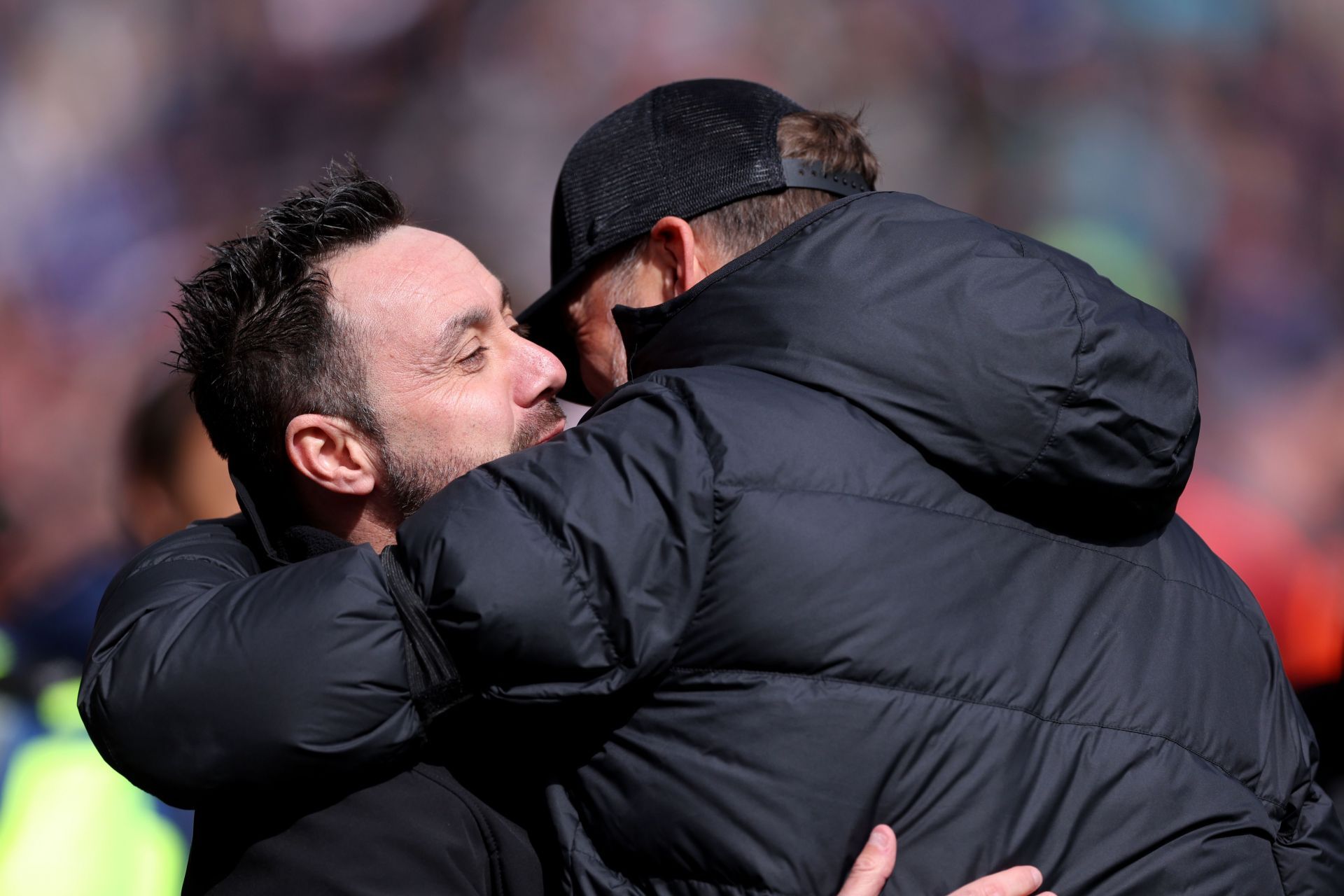  Brighton boss De Zerbi (left) embraces his Liverpool counterpart Jurgen Klopp