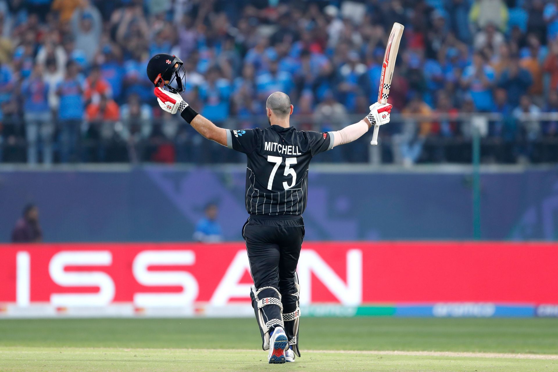 Mitchell celebrates: India v New Zealand - ICC Men's Cricket World Cup India 2023