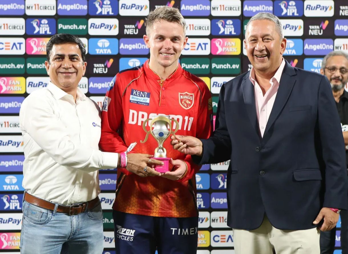 Sam Curran receiving the Player of the Match award