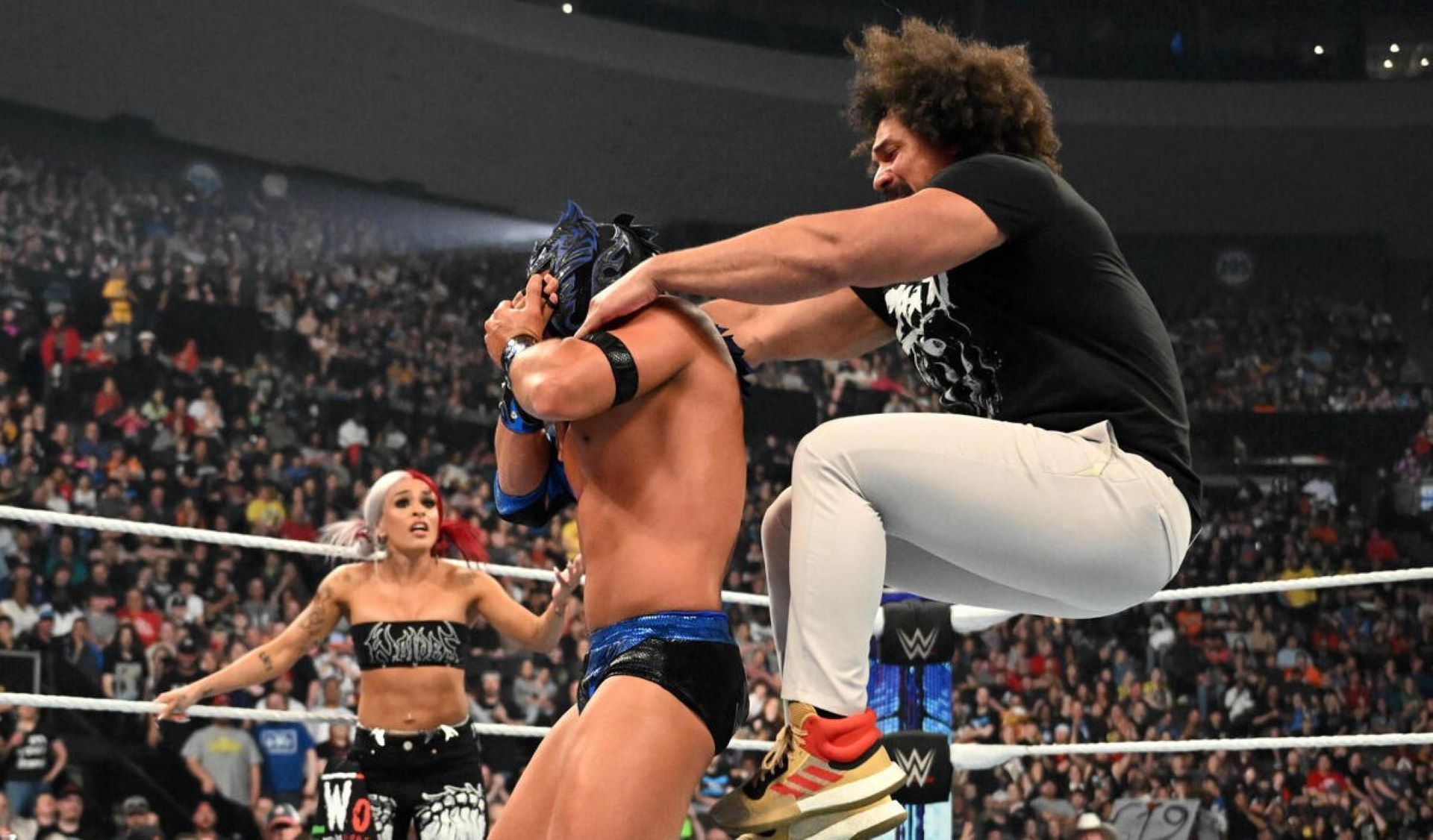 Carlito resented Rey Mysterio for picking Dragon Lee - and then Andrade - over him.