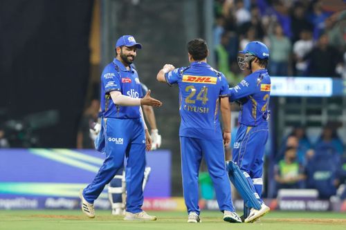 The MI former captain (left) was impressive in the field. (Image Credit: BCCI/ iplt20.com)