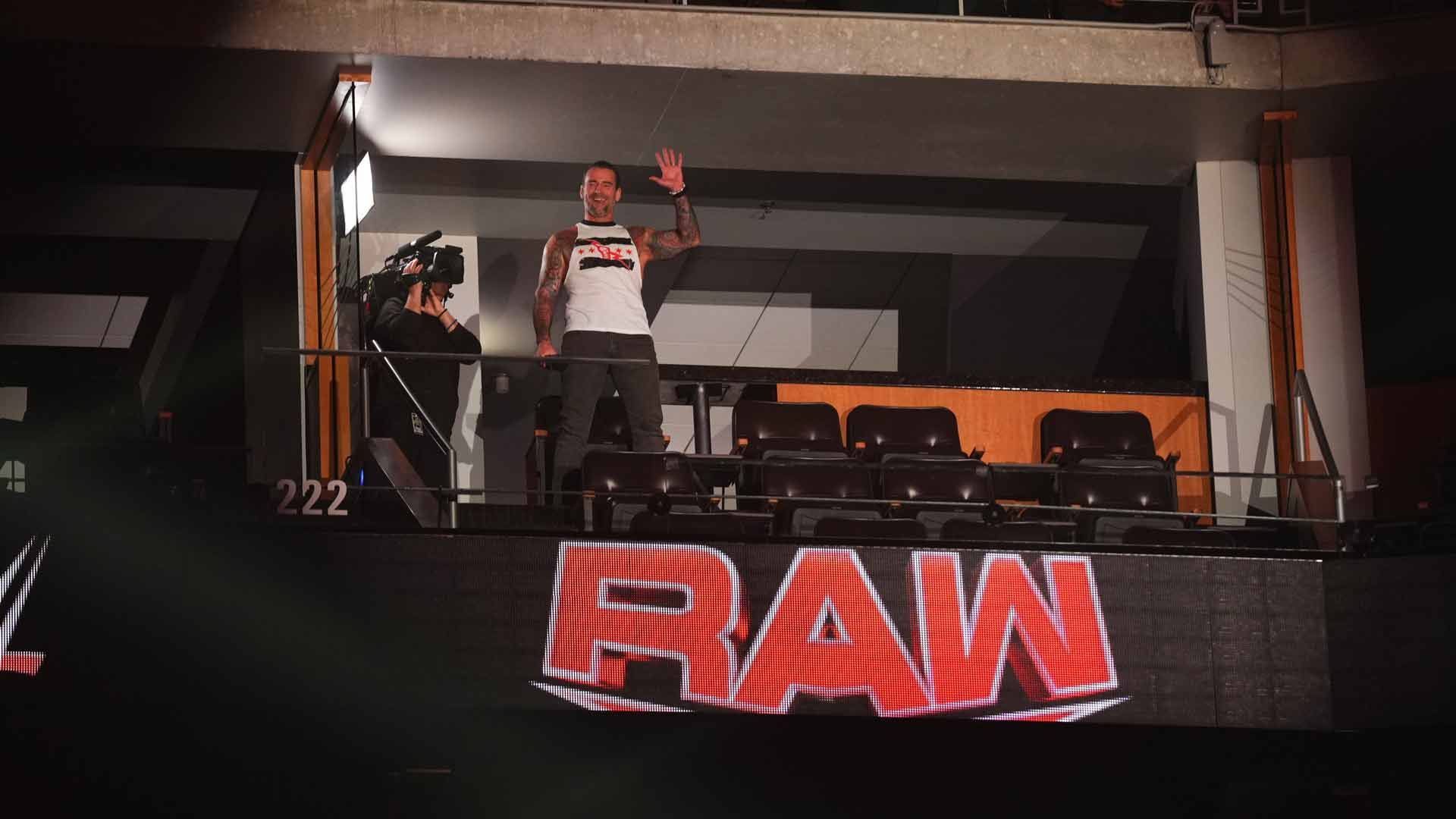 CM Punk is all smiles from a VIP suite on WWE RAW