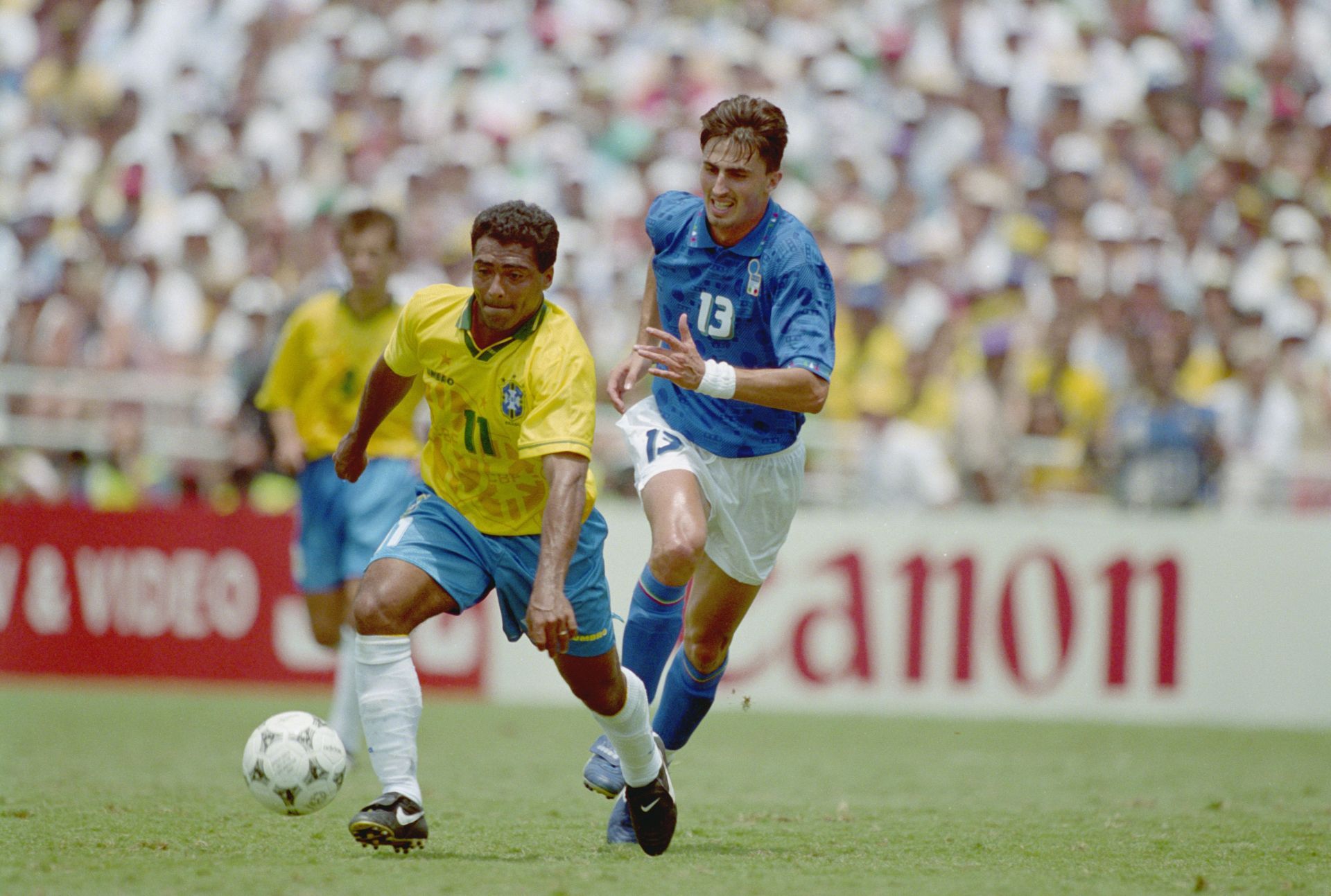 Romario of Brazil and Dino Baggio of Italy (Photo by Mike Hewitt/Getty Images)
