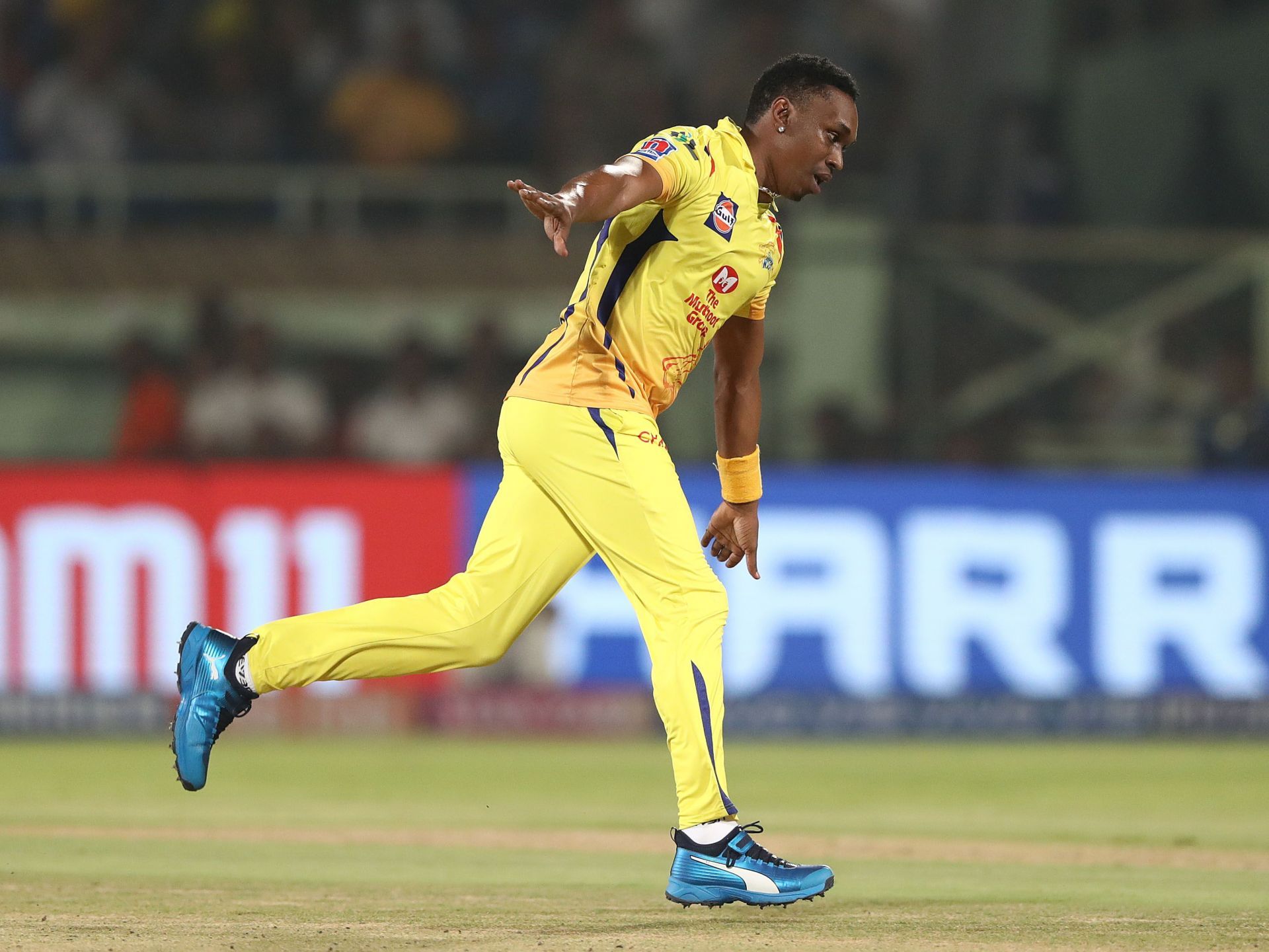 Dwayne Bravo celebrates a wicket in his trademark style. (Image Credit: Getty Images)