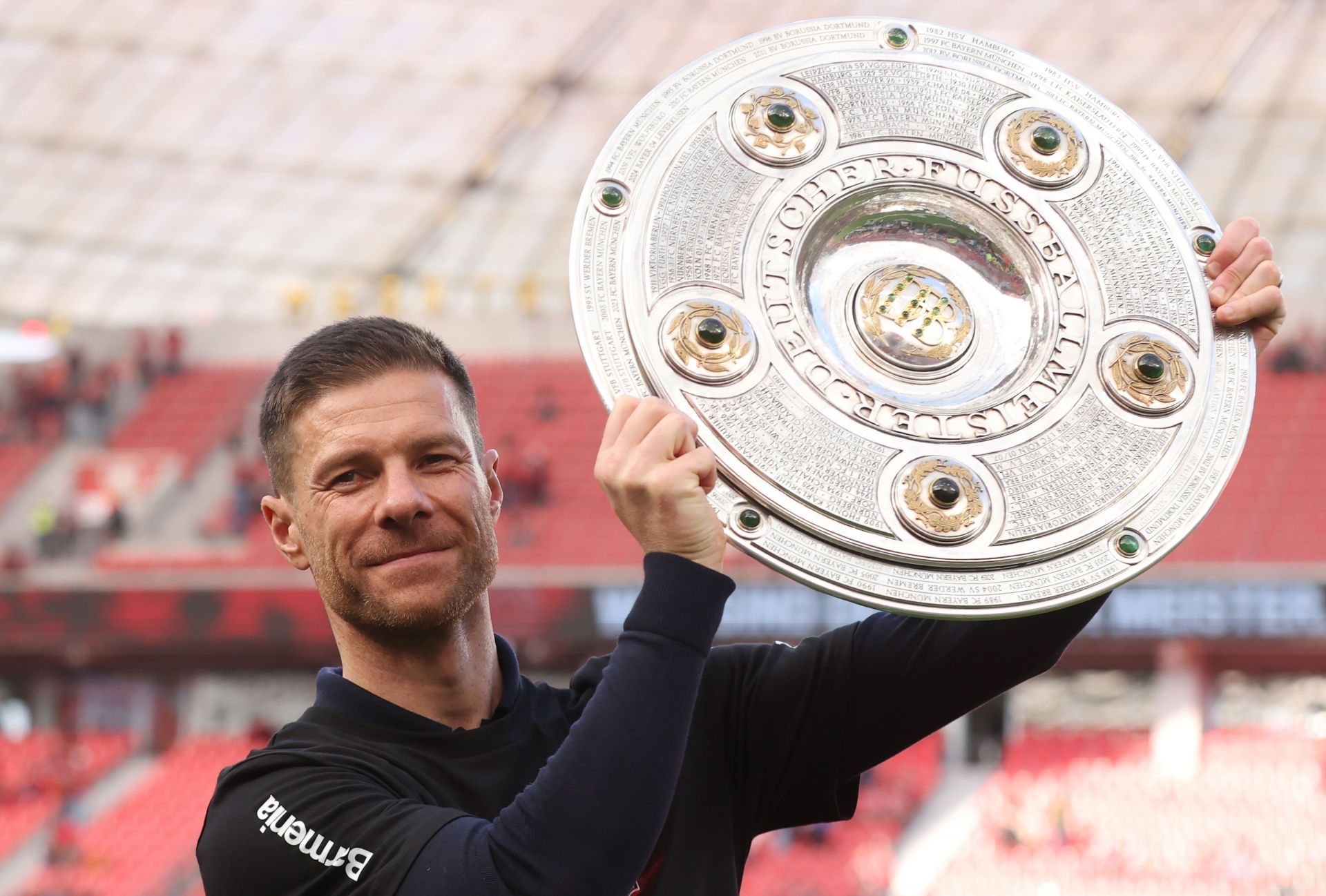 Bayer 04 Leverkusen boss celebrates the Bundesliga title.