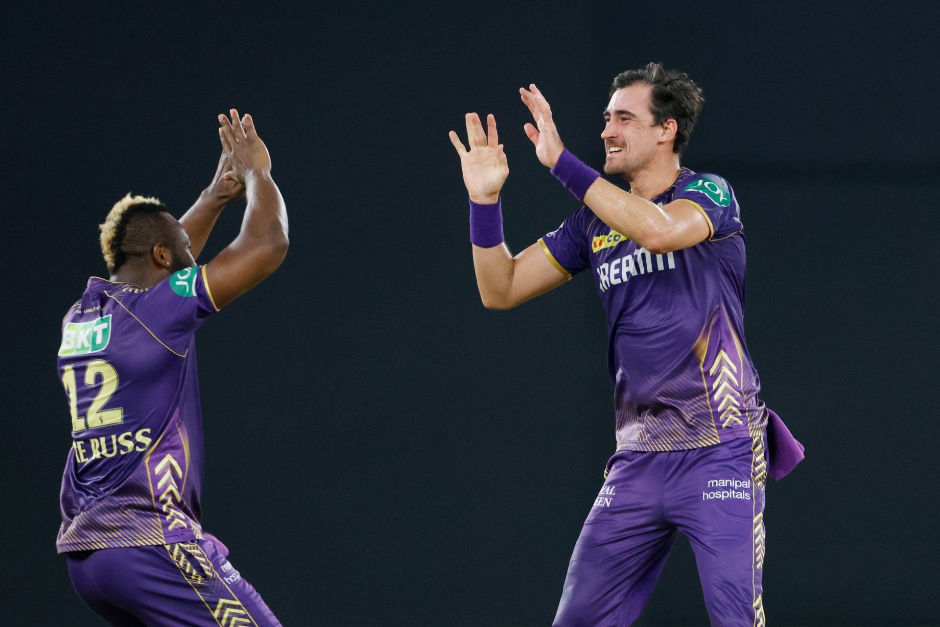 Mitchell Starc and Andre Russell celebrate a wicket. (Credits: Twitter)