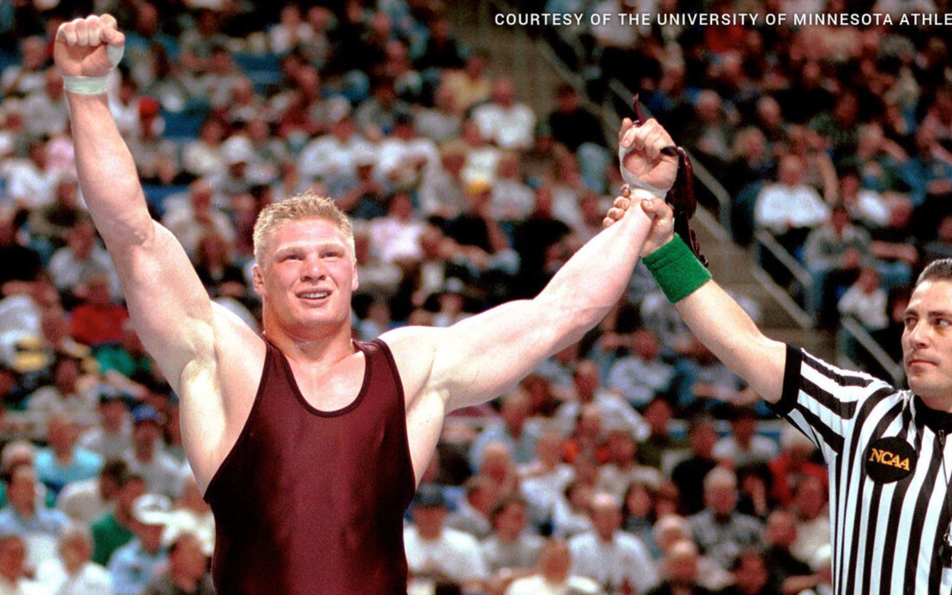 Brock Lesnar celebrating a win as an amateur wrestler. [photo credits: WWE.com]