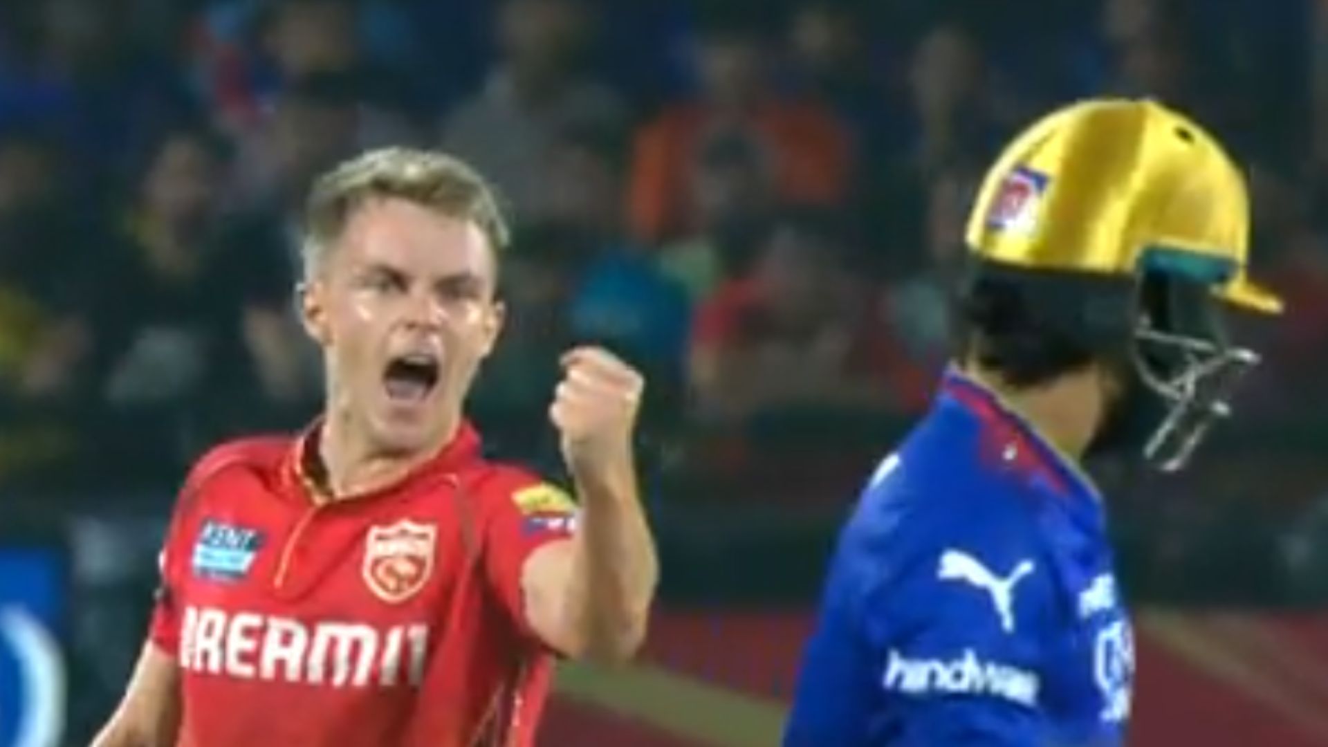 Sam Curran reacts after dismissing Rajat Patidar