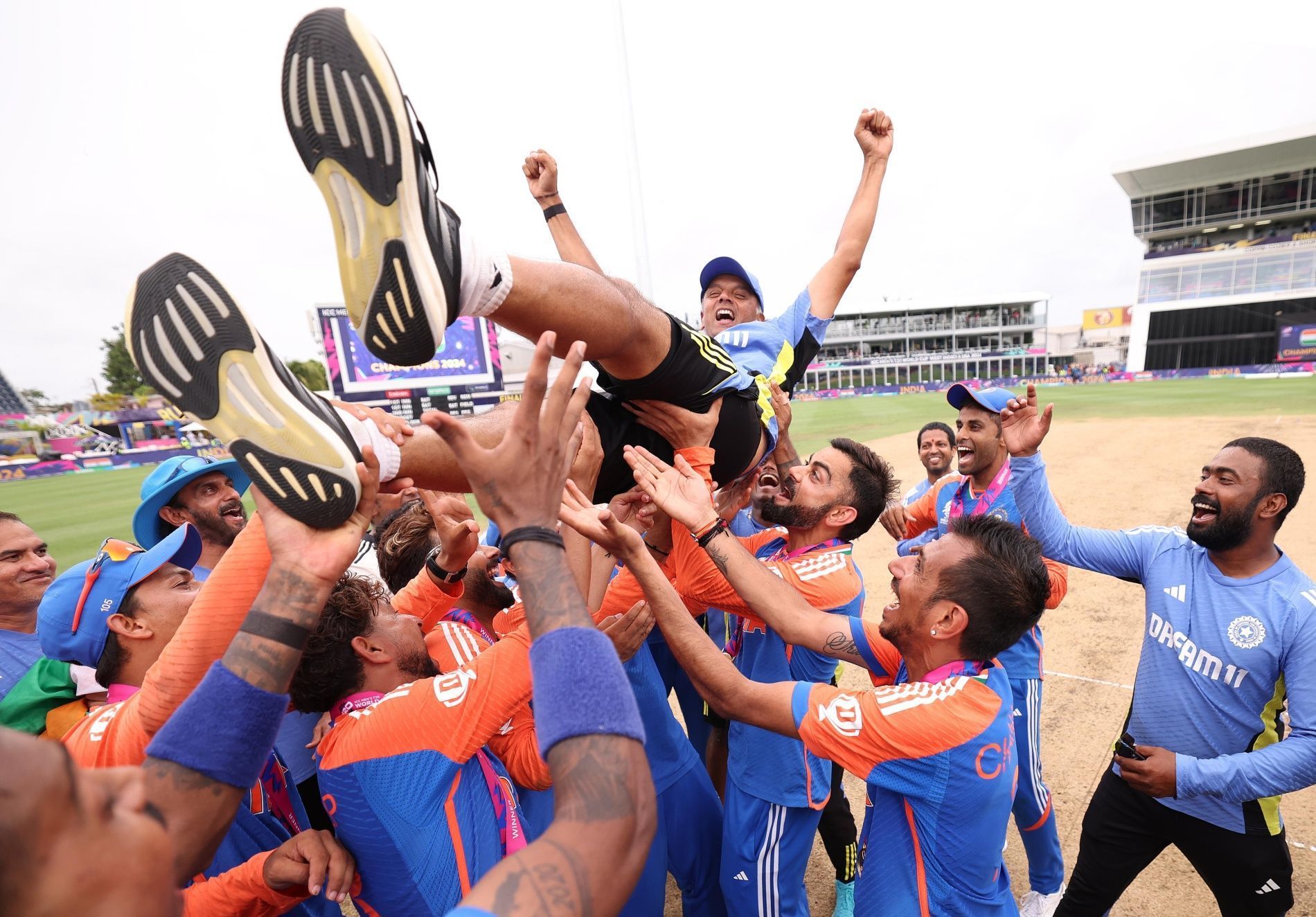 Team India players lift outgoing head coach Rahul Dravid. (Image Credit: ICC/ X)