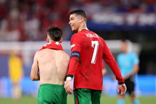 Francisco Conceicao (left) and Cristiano Ronaldo