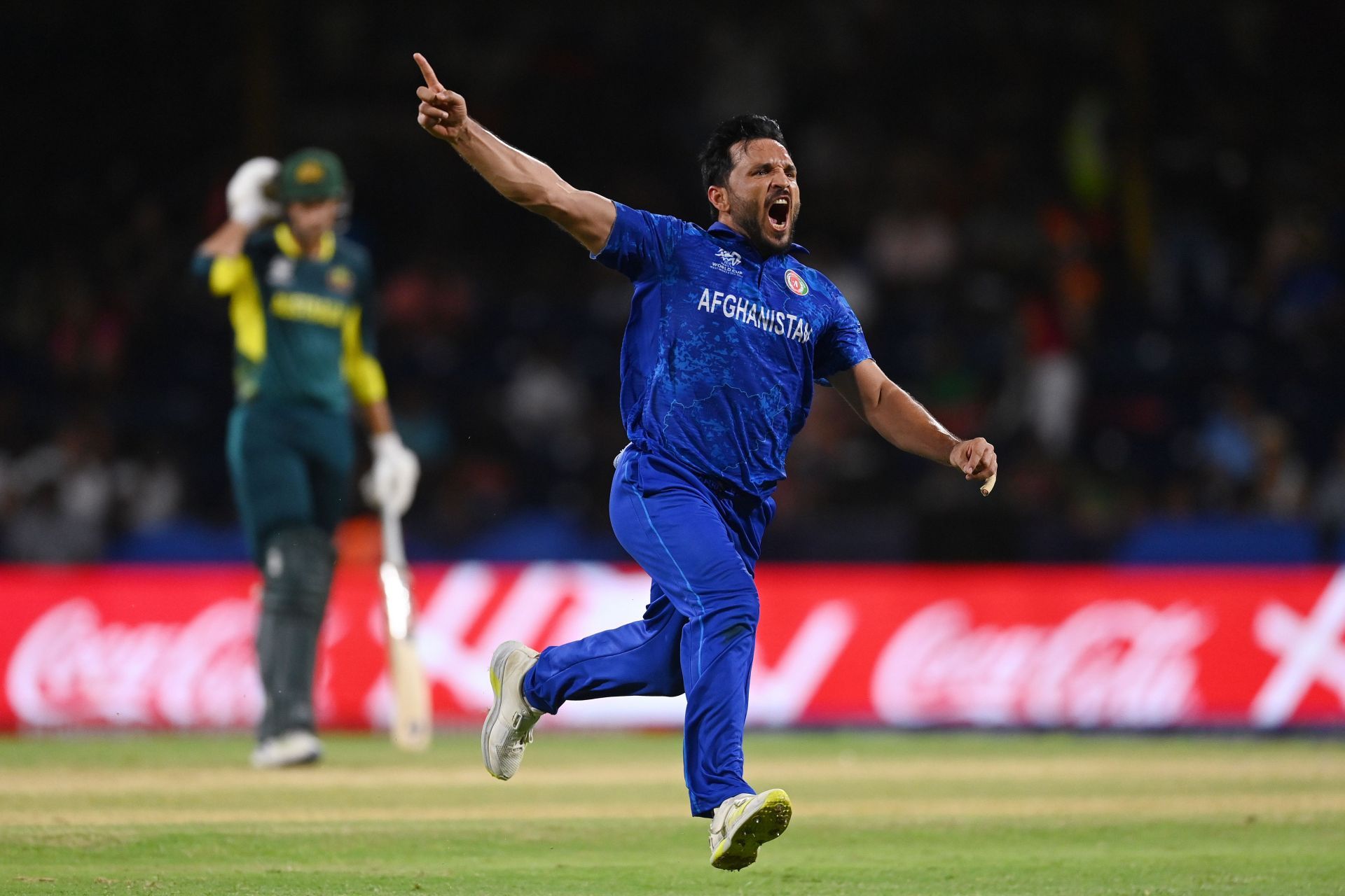 Gulbadin Naib celebrates a wicket against Australia. (Image Credit: Getty Images)