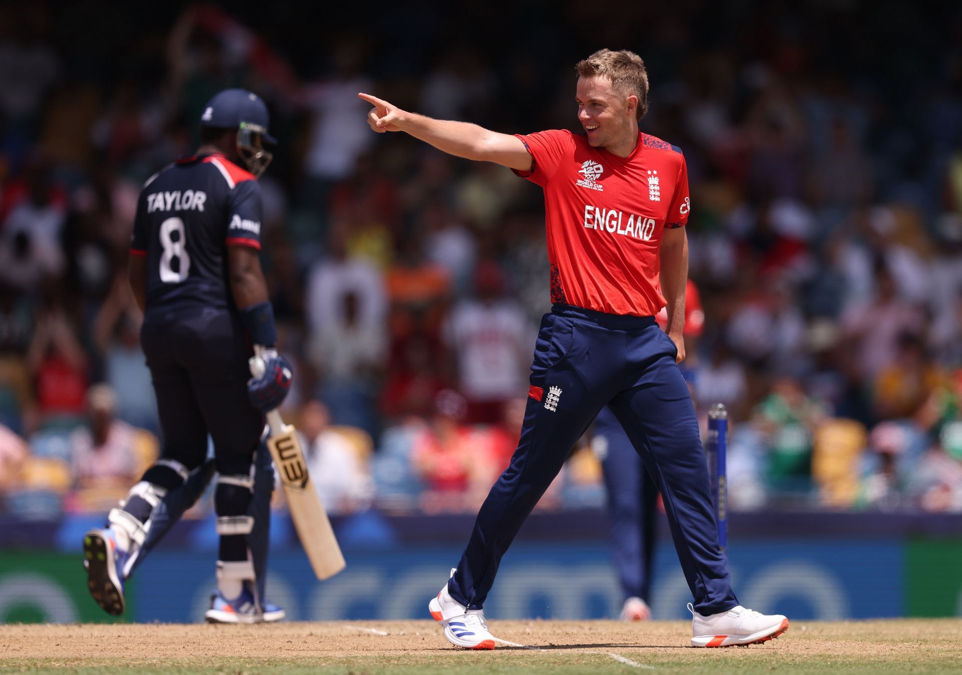 Sam Curran of England celebrates the wicket of Steven Taylor of the USA during the ICC Men&#039;s T20 Cricket World Cup West Indies &amp; USA 2024 Super Eight match between USA and England at Kensington Oval on June 23, 2024 in Bridgetown, Barbados. (Photo by Robert Cianflone/Getty Images)