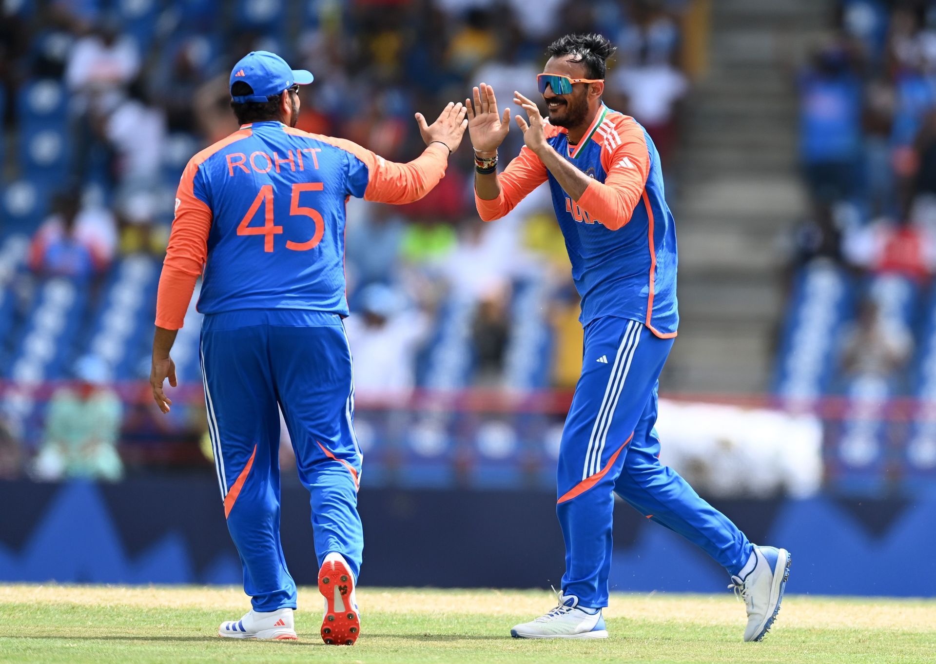Axar Patel (right) with Rohit Sharma (Image Credit: Getty Images)