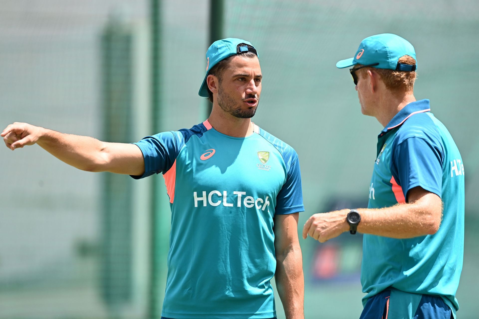 Marcus Stoinis (left) speaks with Australia coach Andrew McDonald. (Image Credit: Getty Images)