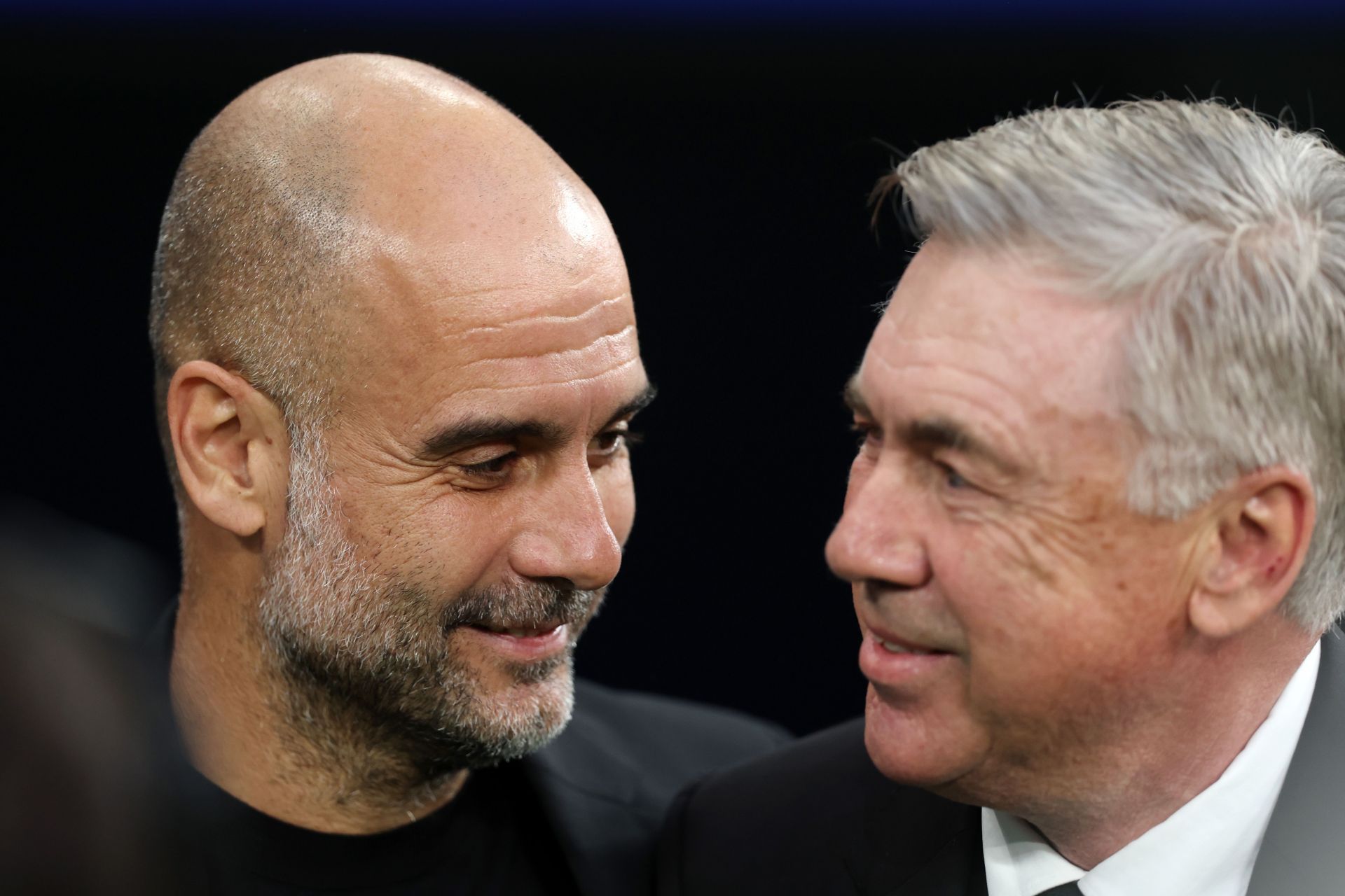 Manchester City boss Pep Guardiola (left) and Real Madrid manager Carlo Ancelotti