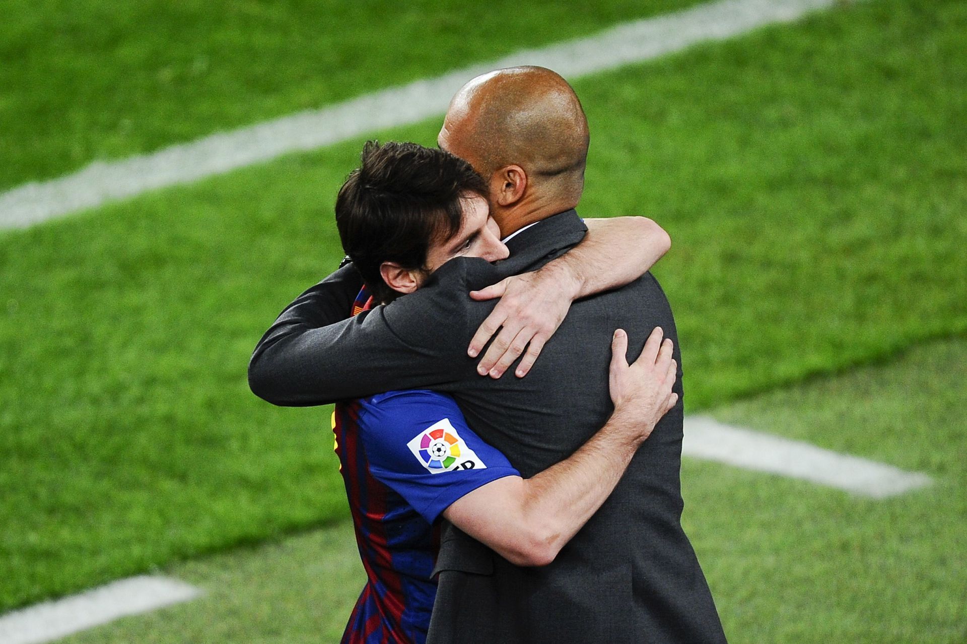 Barcelona legend Lionel Messi (left) and Pep Guardiola