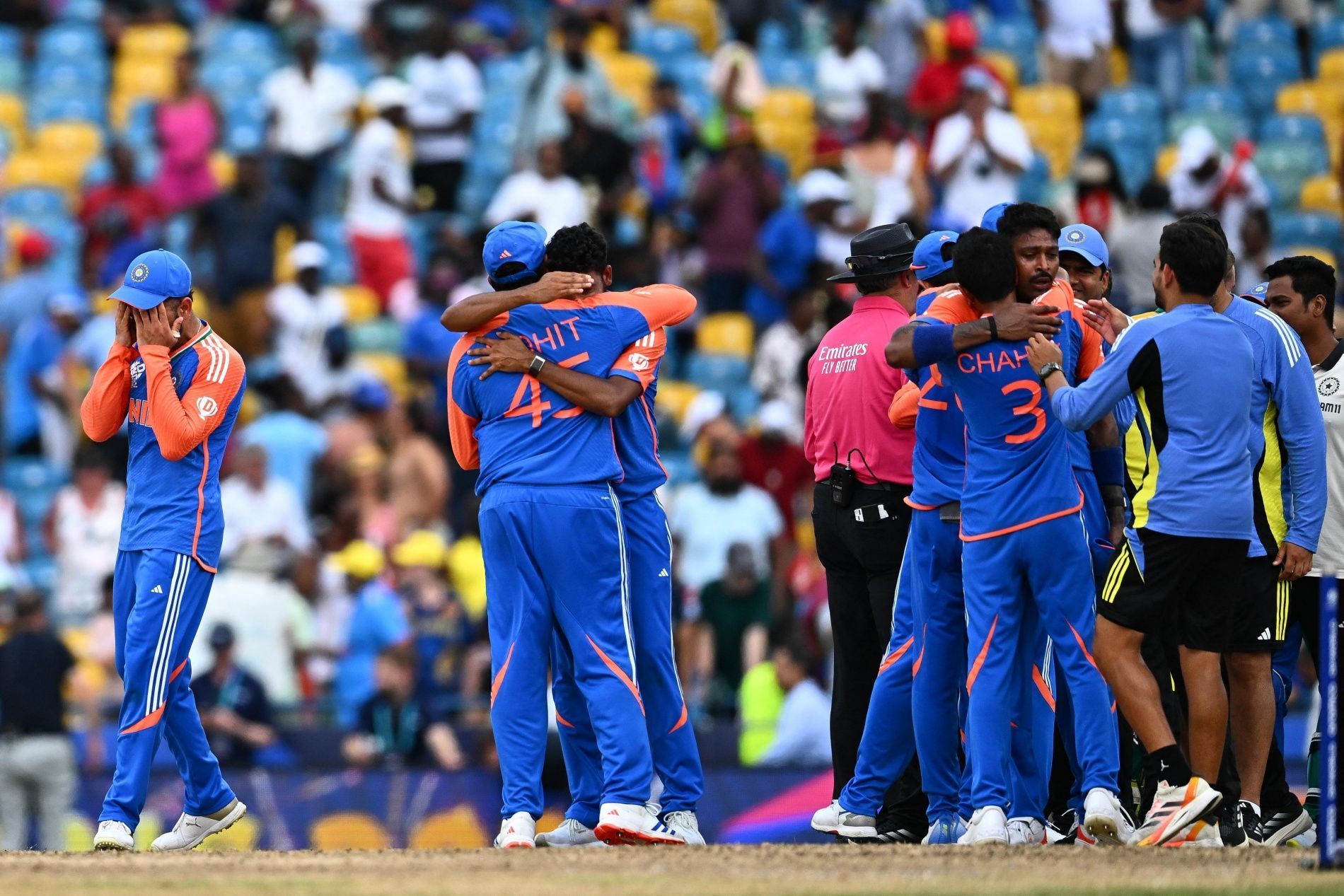 Team India players embrace each other after an emotional final. (Image Credit: ICC/ X)