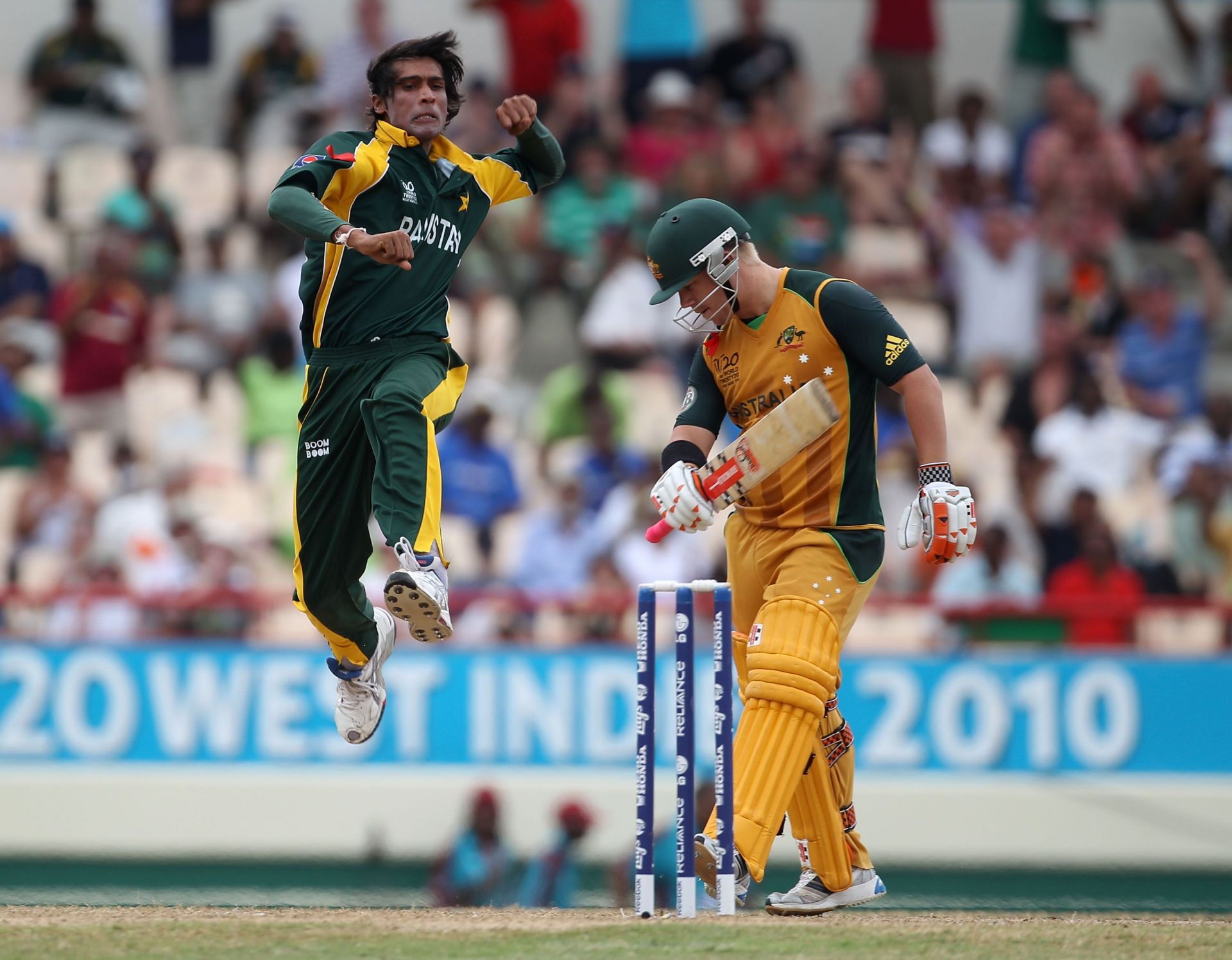 Mohammad Aamer of Pakistan celebrates the wicket of David Warner of Australia during the ICC World Twenty20 semi-final between Australia and Pakistan at the Beausjour Cricket Ground on May 14, 2010, in Gros Islet, Saint Lucia. (Photo by Clive Rose/Getty Images).