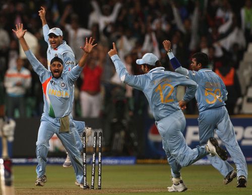 Harhajan Singh, Virender Sehwag, Yuvraj Singh and Sreesanth of India celebrate the run out of Misbah-ul-Haq of Pakistan of the last ball of the innings, which tied the match forcing a bowl-off eventually won by India during the ICC Twenty20 Cricket World Championship match between India and Pakistan at Kingsmead on September 14, 2007 in Durban, South Africa. (Photo by Hamish Blair/Getty Images)